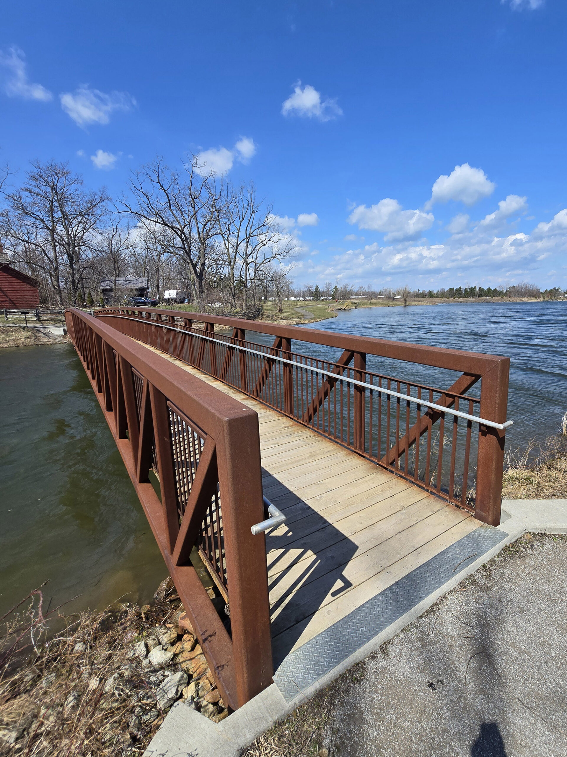 A walking bridge over the fishing pond at Fifty Point Conservation Area.