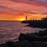 The shoreline of Fifty Point Conservation Area at sunrise.