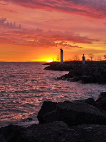The shoreline of Fifty Point Conservation Area at sunrise.