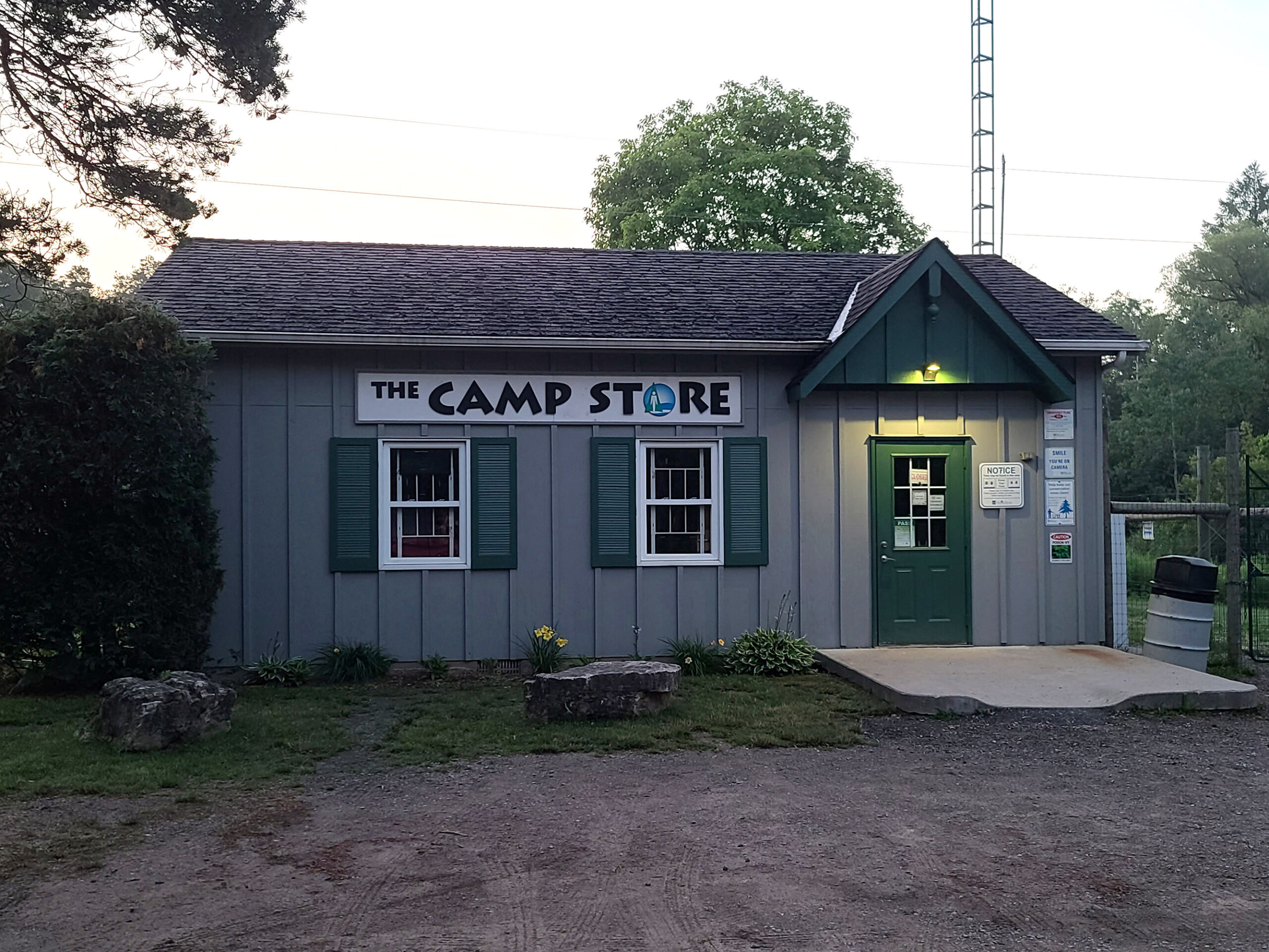 A small building, labeled camp store.