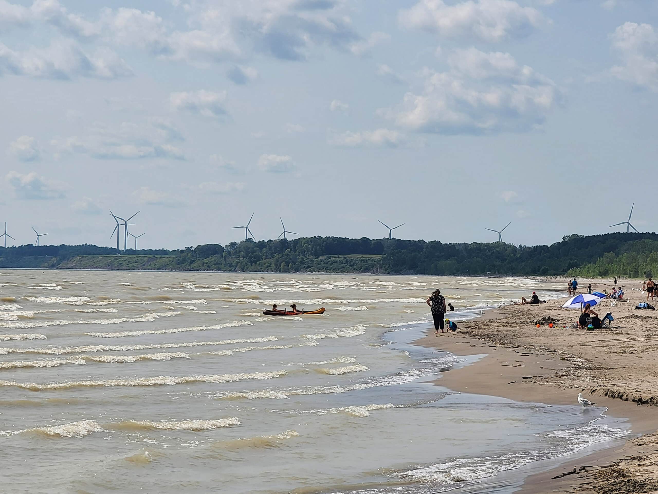 The beach at port burwell, with many waves rolling in.