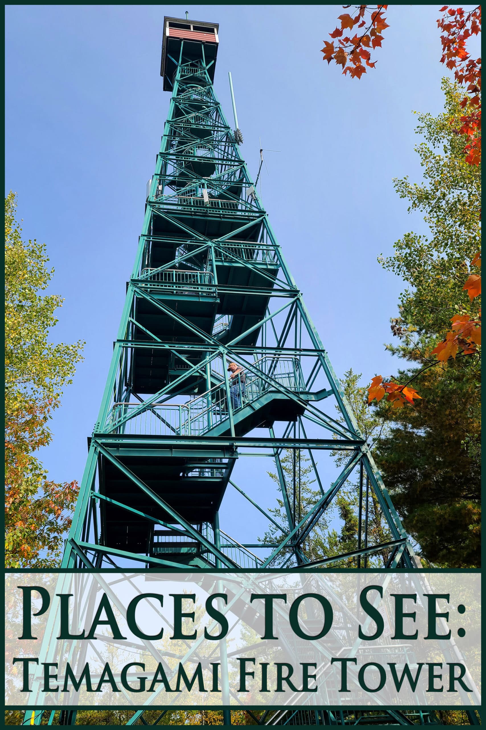 A teal coloured metal tower. Overlaid text says places to see the temagami fire tower.
