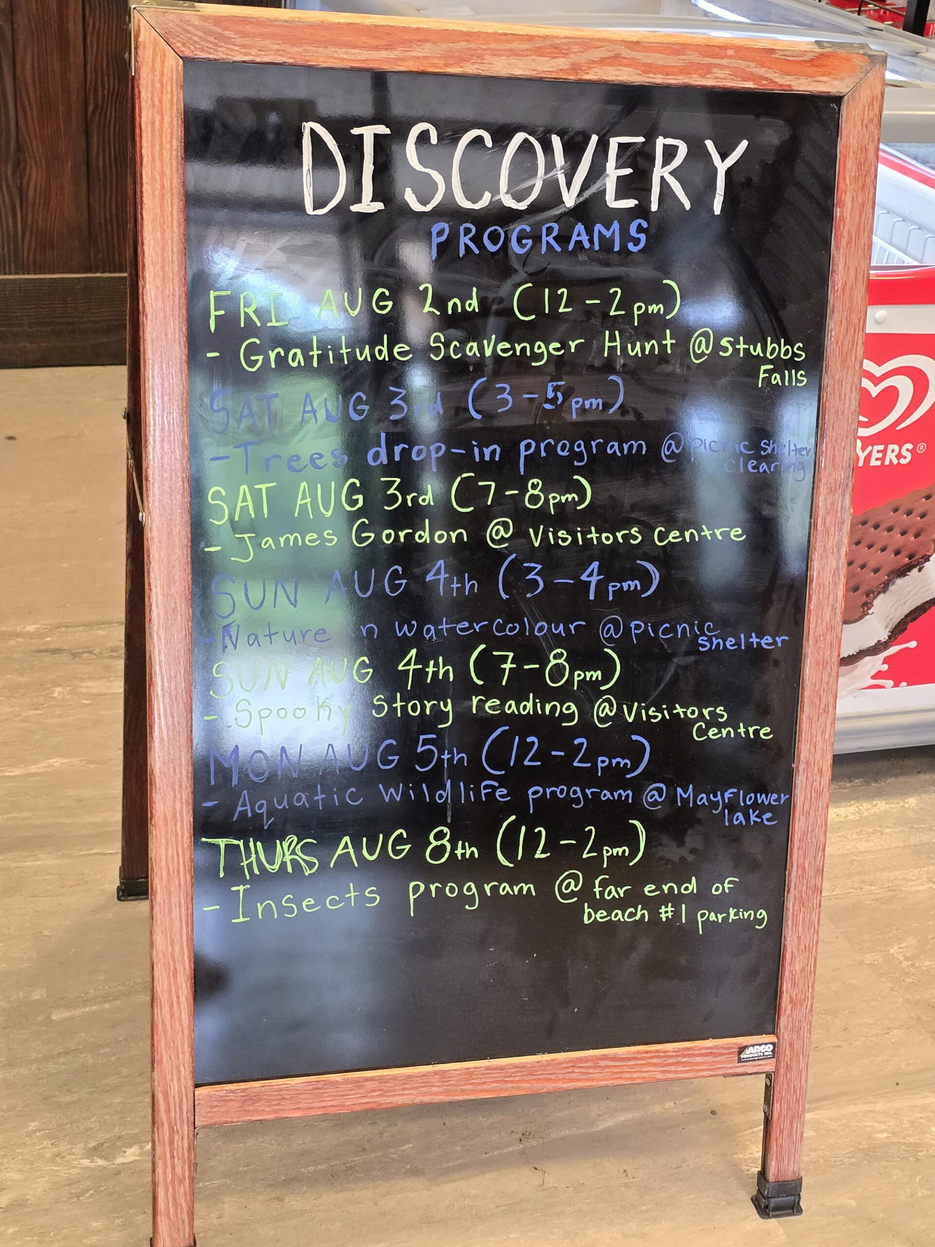A sign in the arrowhead pp visitor centre, talking about the discovery program schedule.