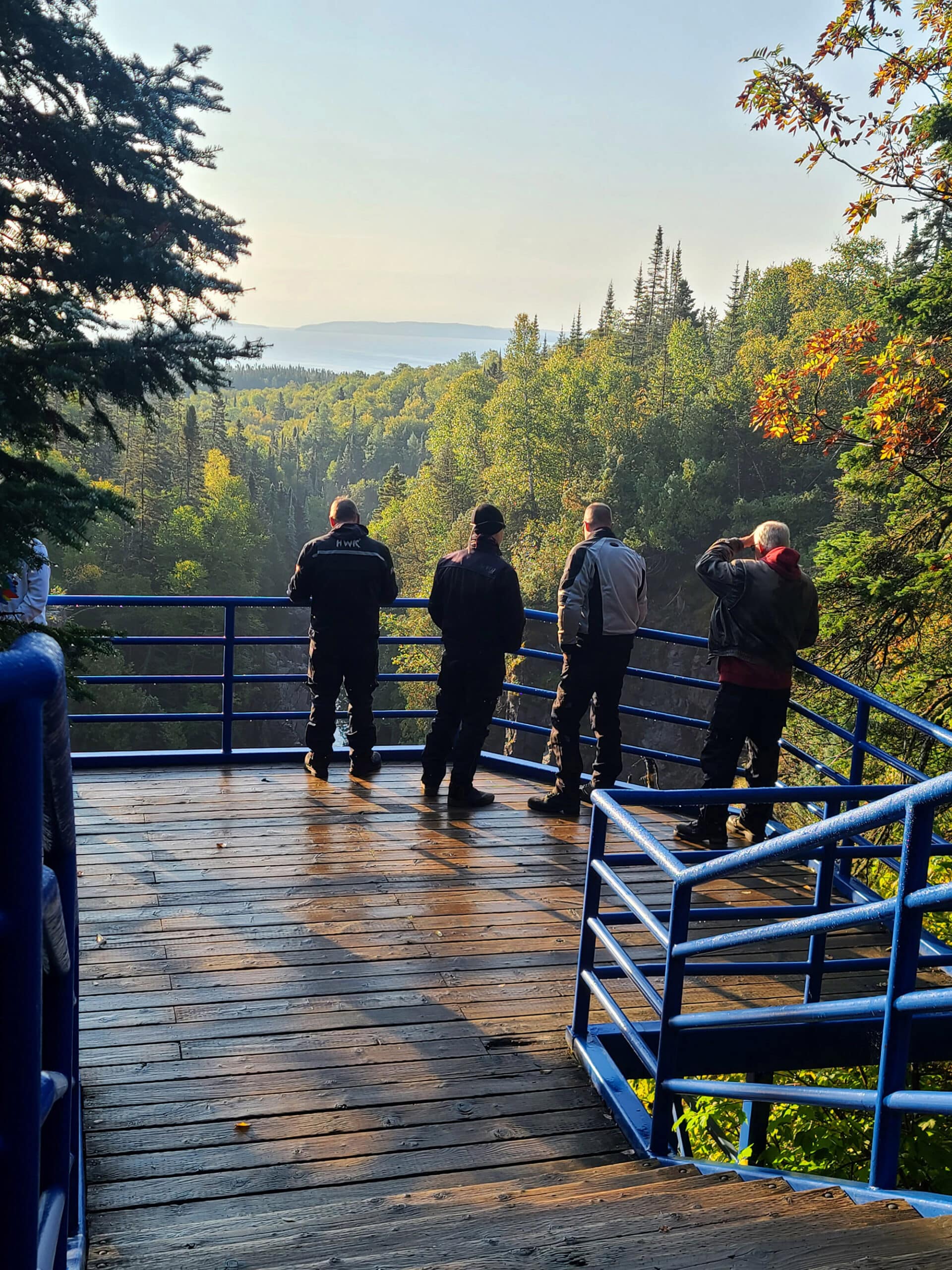 4 old biker dudes lookout out over aguasabon falls.