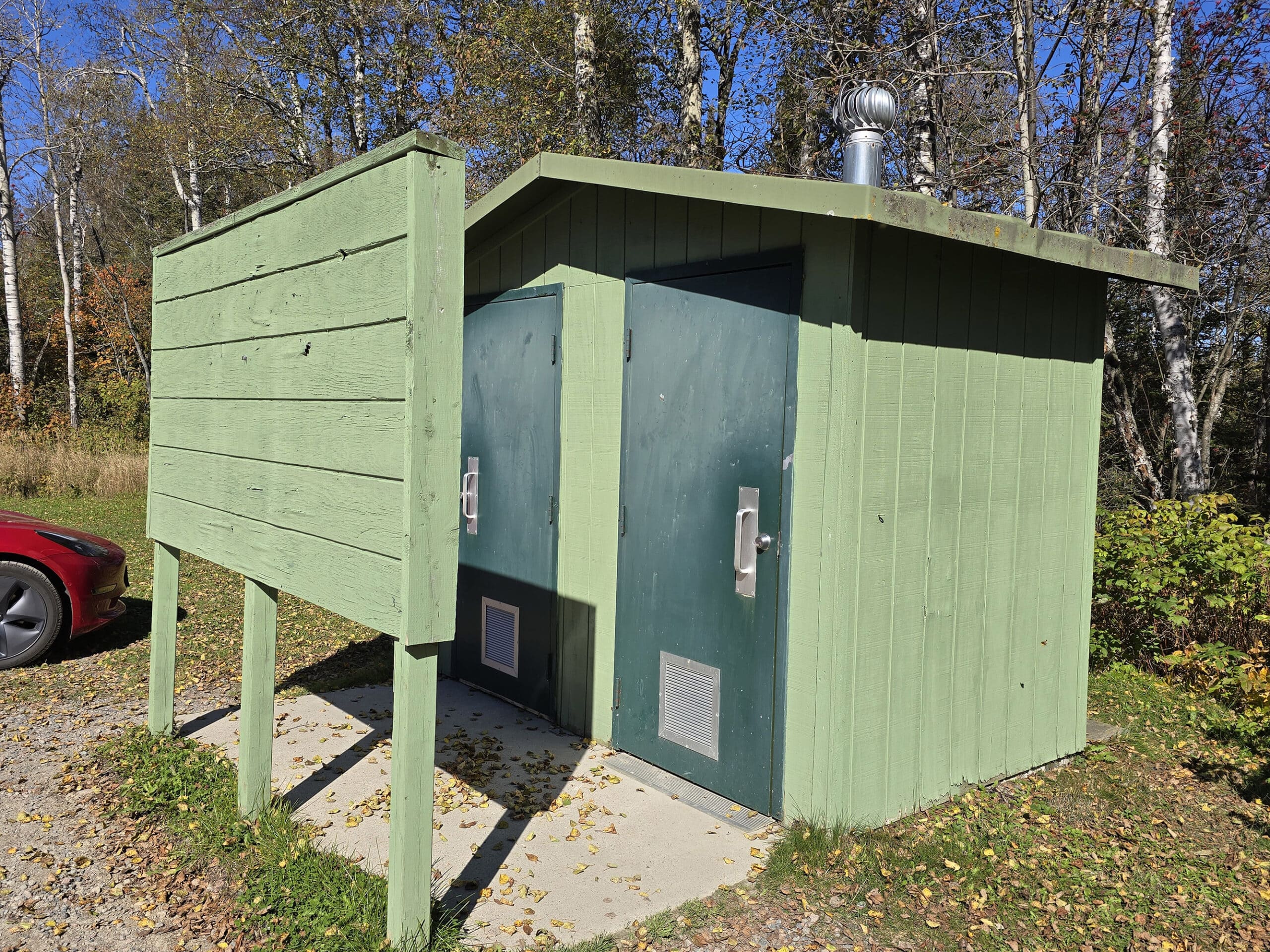 A green washroom building.