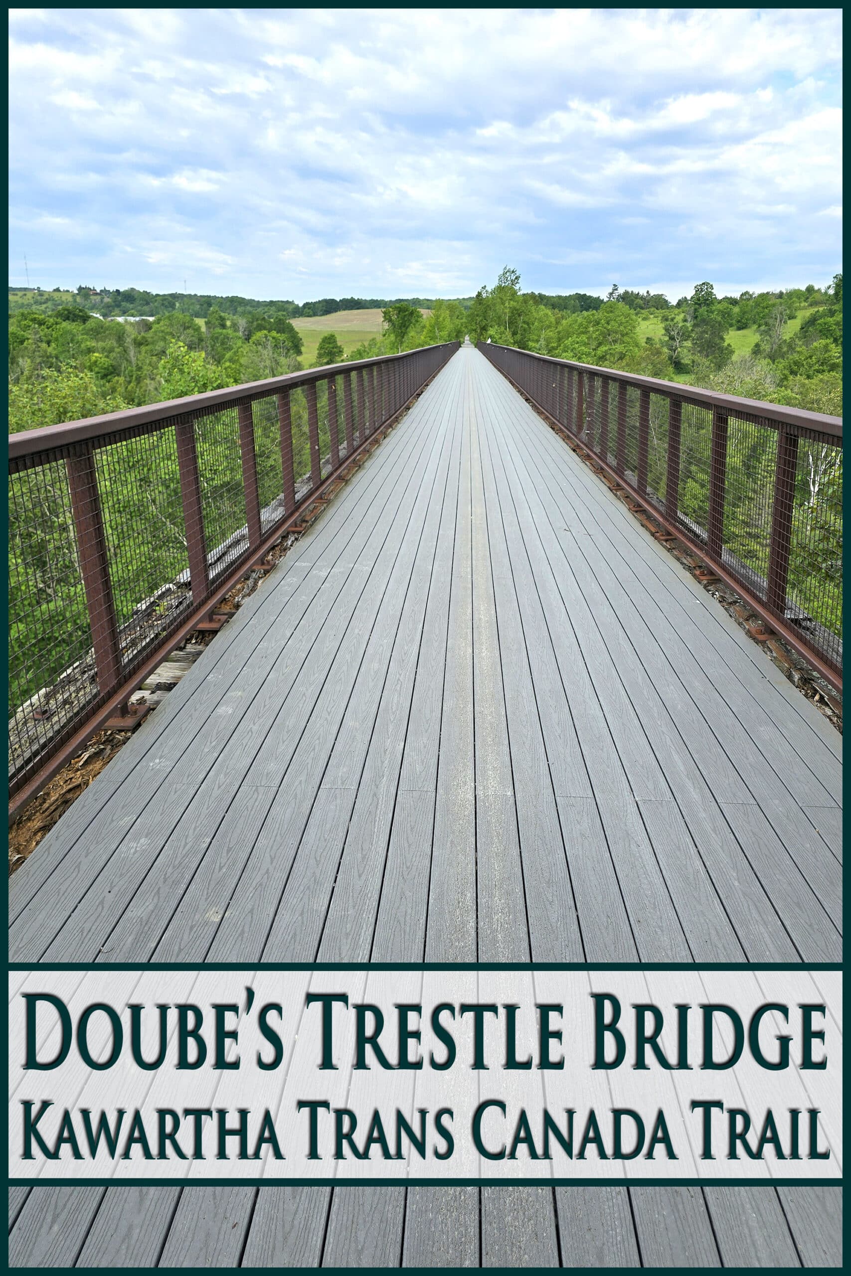 A long trestle bridge, extending into the distance. Overlaid text says doube’s trestle bridge.