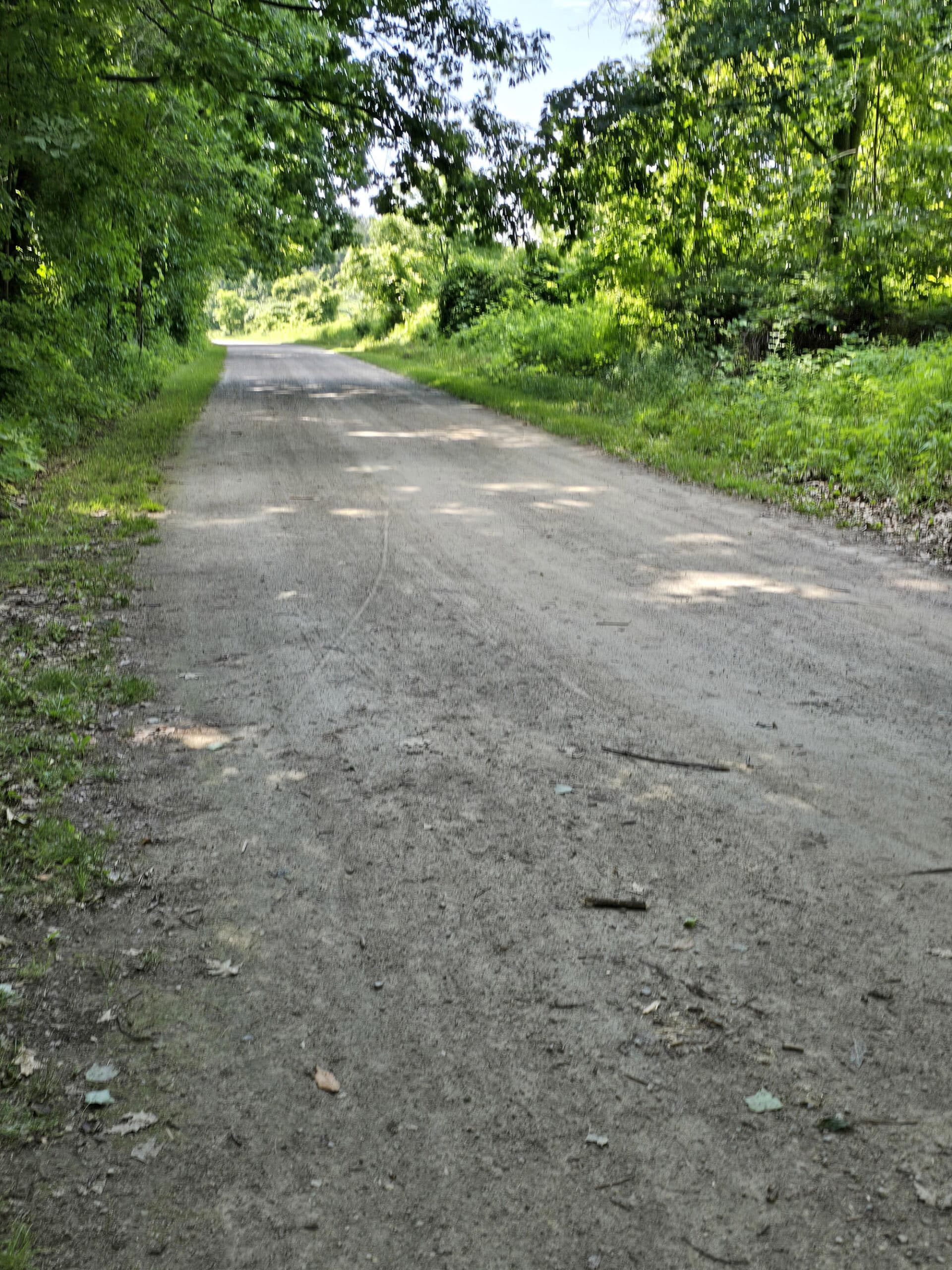 A wide gravel road.