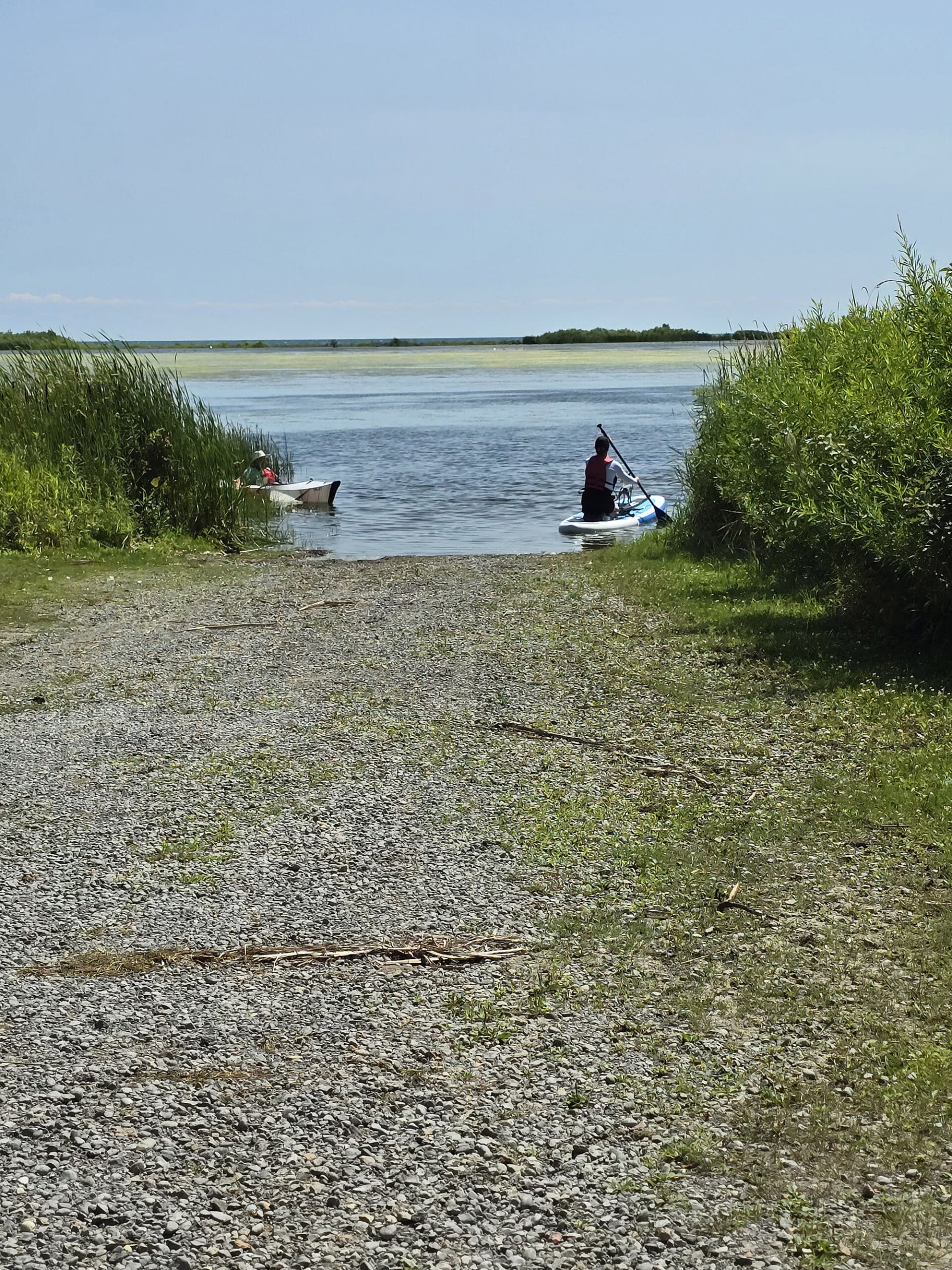 An unpaved boat launch on McLaughlin Bay at Darlington Provincial park.