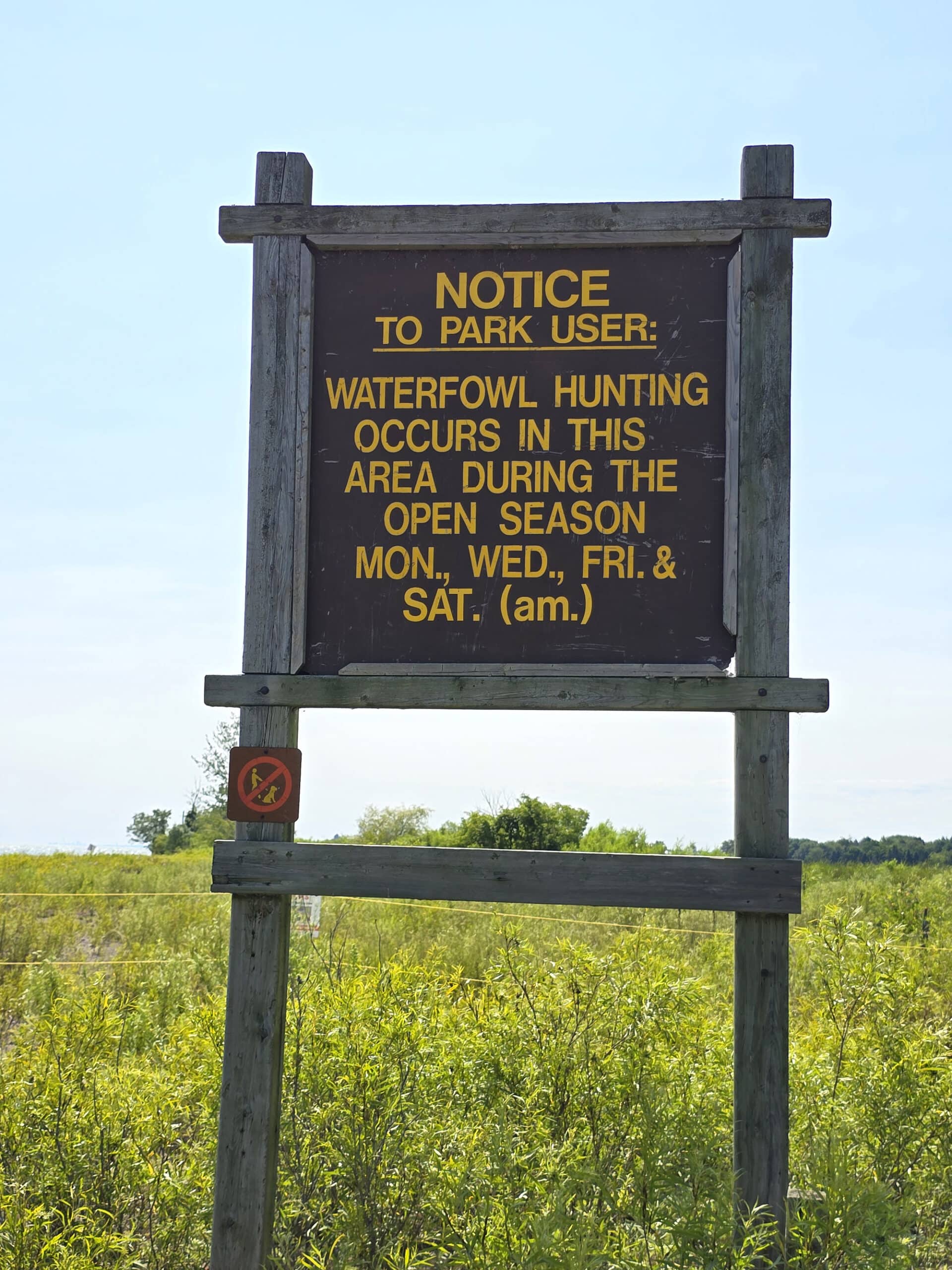 A park sign talking about the duck hunt.