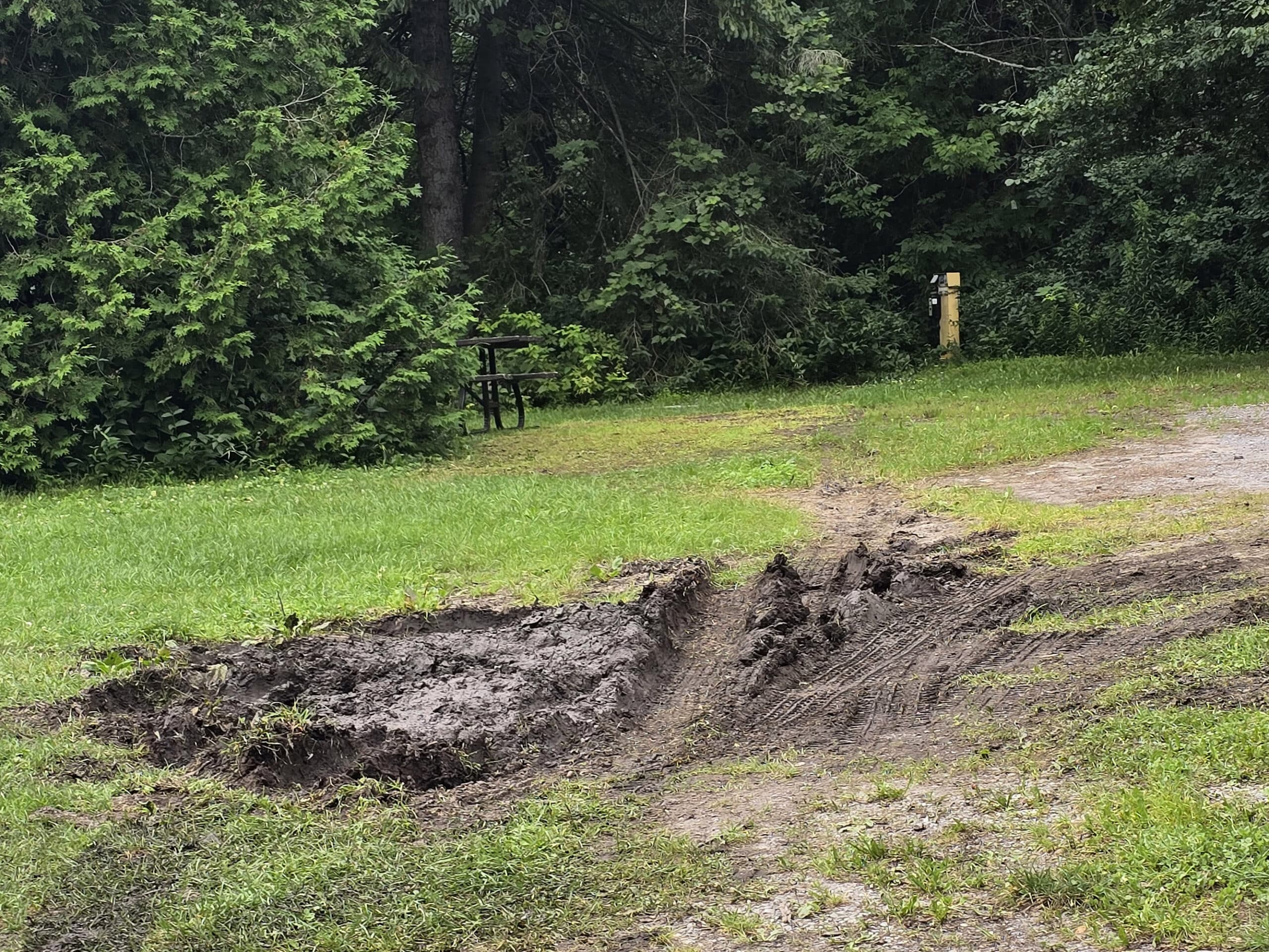 An incredibly muddy campsite at darlington provincial park.