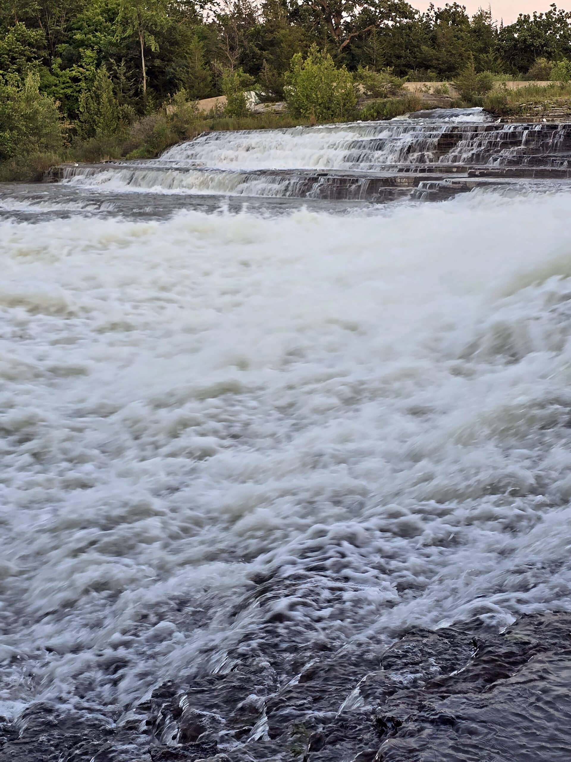 Healey Falls Cascade Waterfall and dam and high flow.