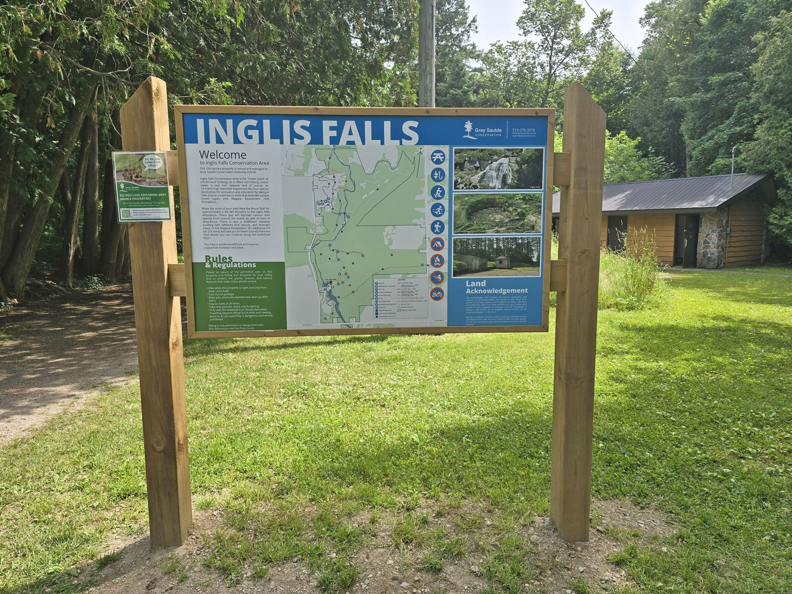 A large trail map sign of Inglis Falls Conservation Area.