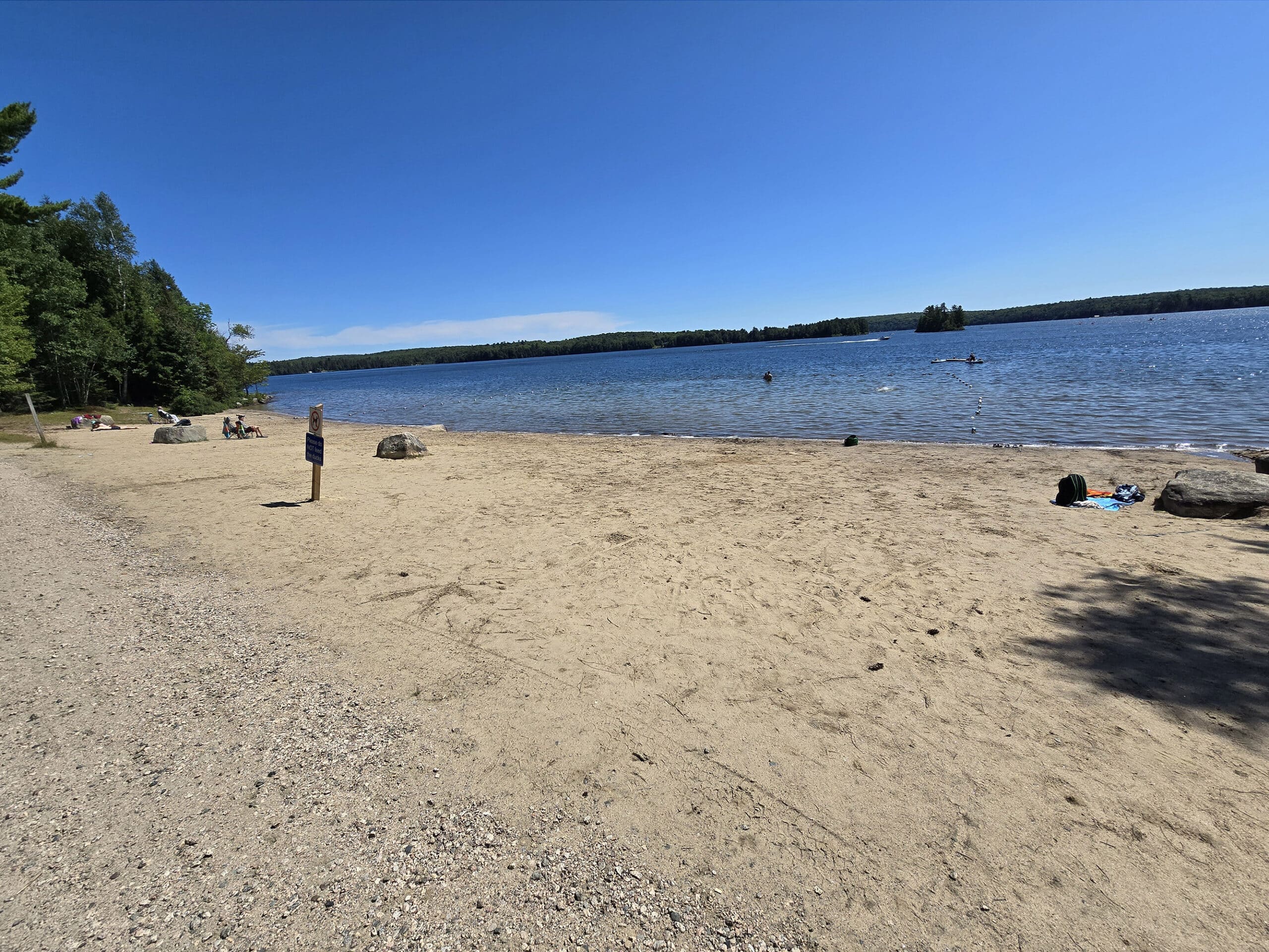 A sandy beach on Eagle Lake.