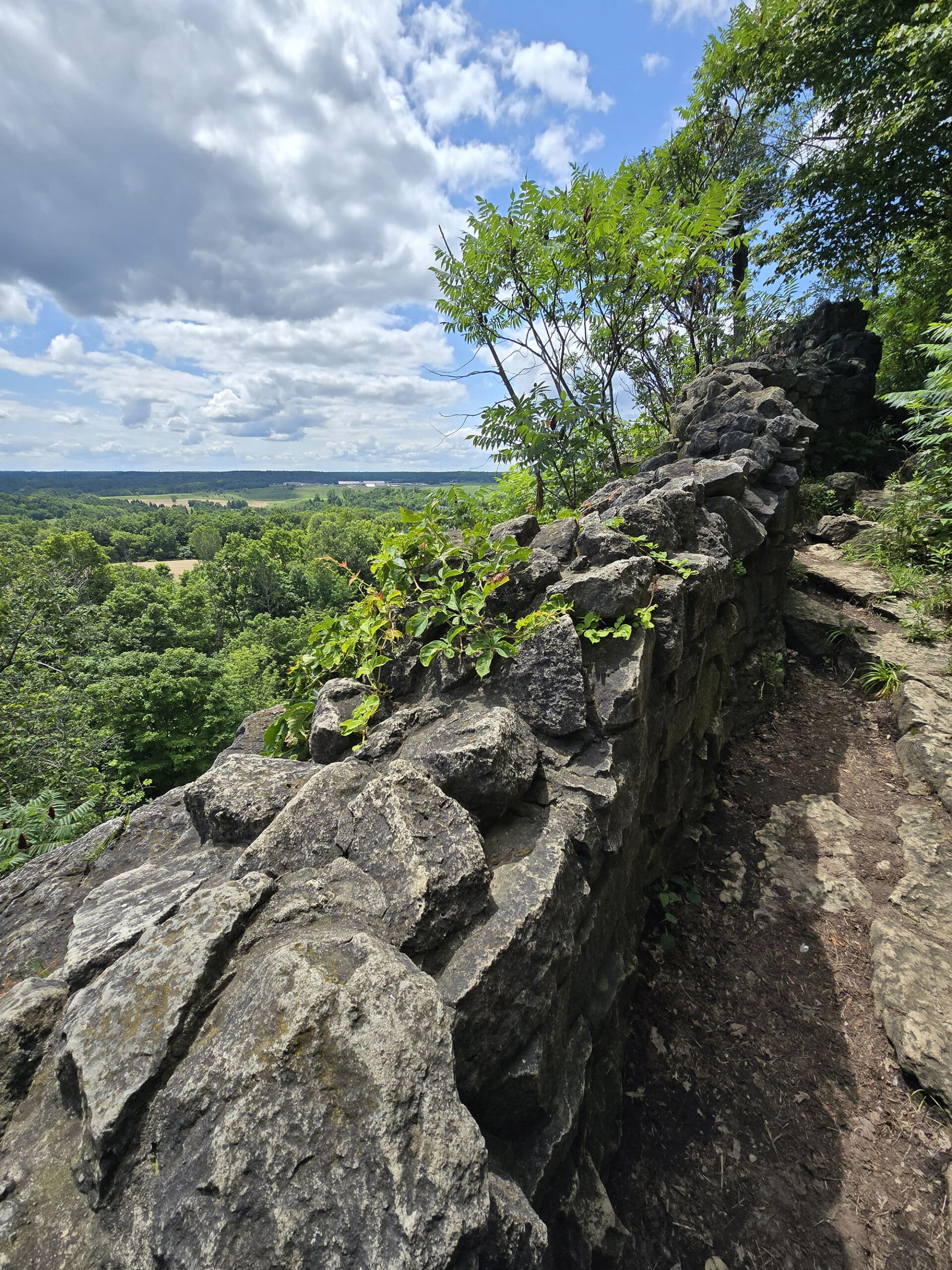 A rock wall at an overlook over the niagara escarpment.