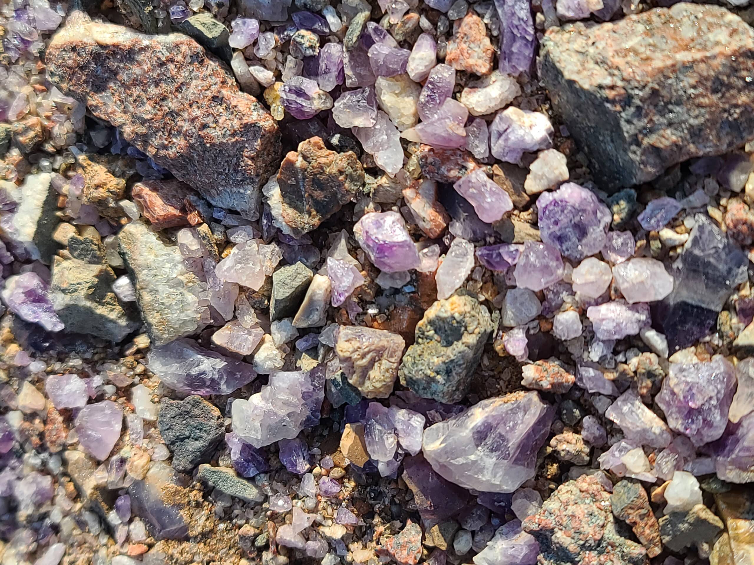 Piles of unrefined amethysts underfoot.