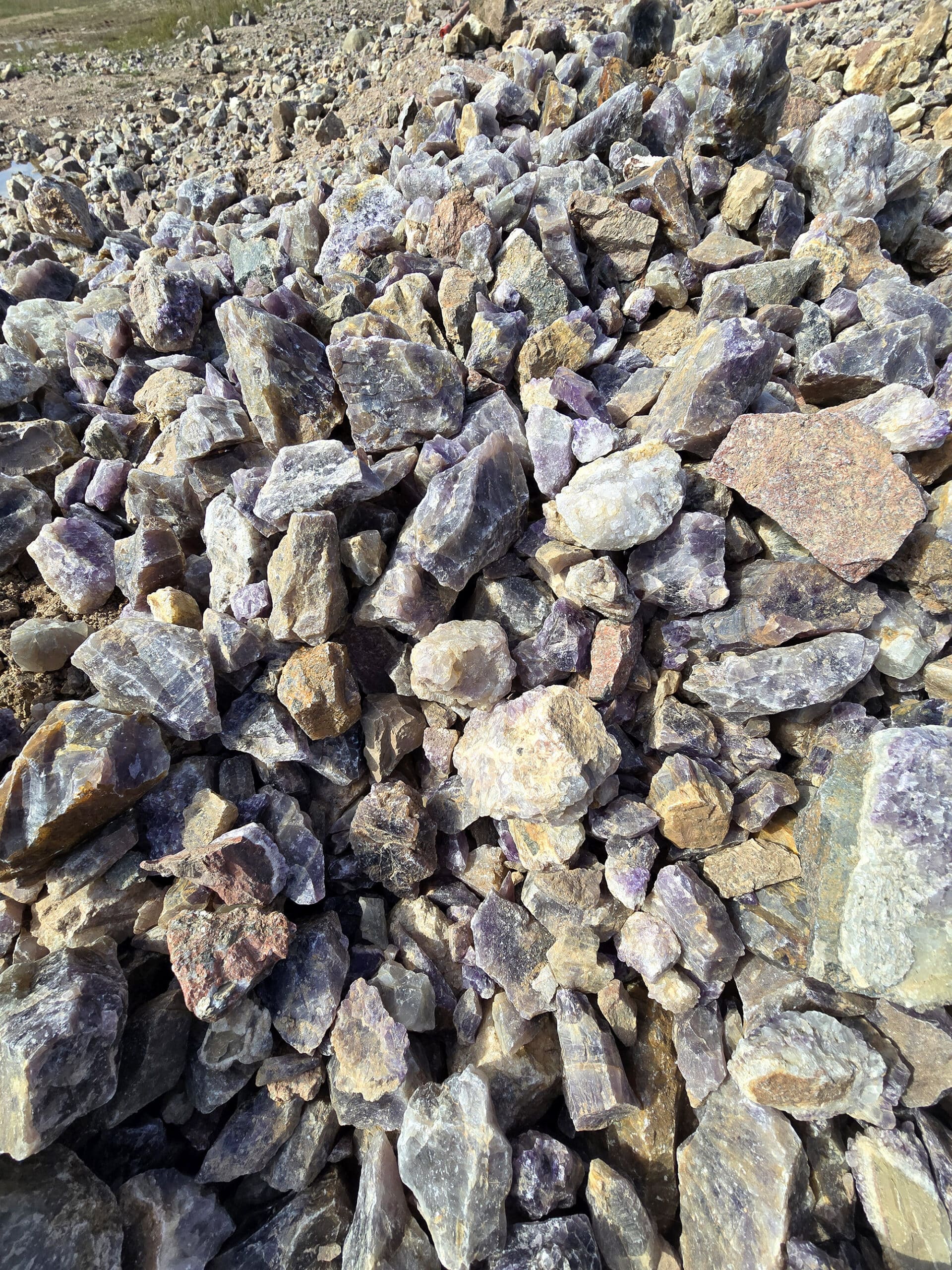 Piles of unrefined amethysts underfoot.