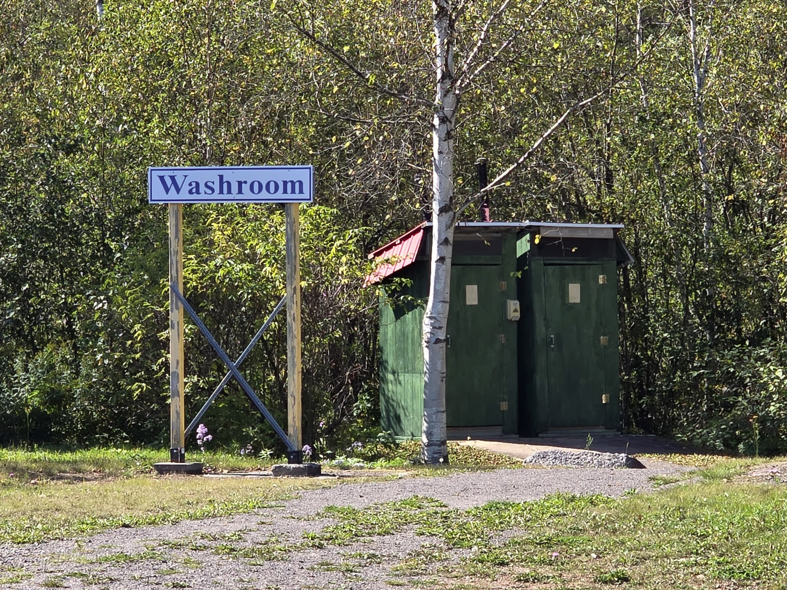 A scary, dilapidated outhouse.