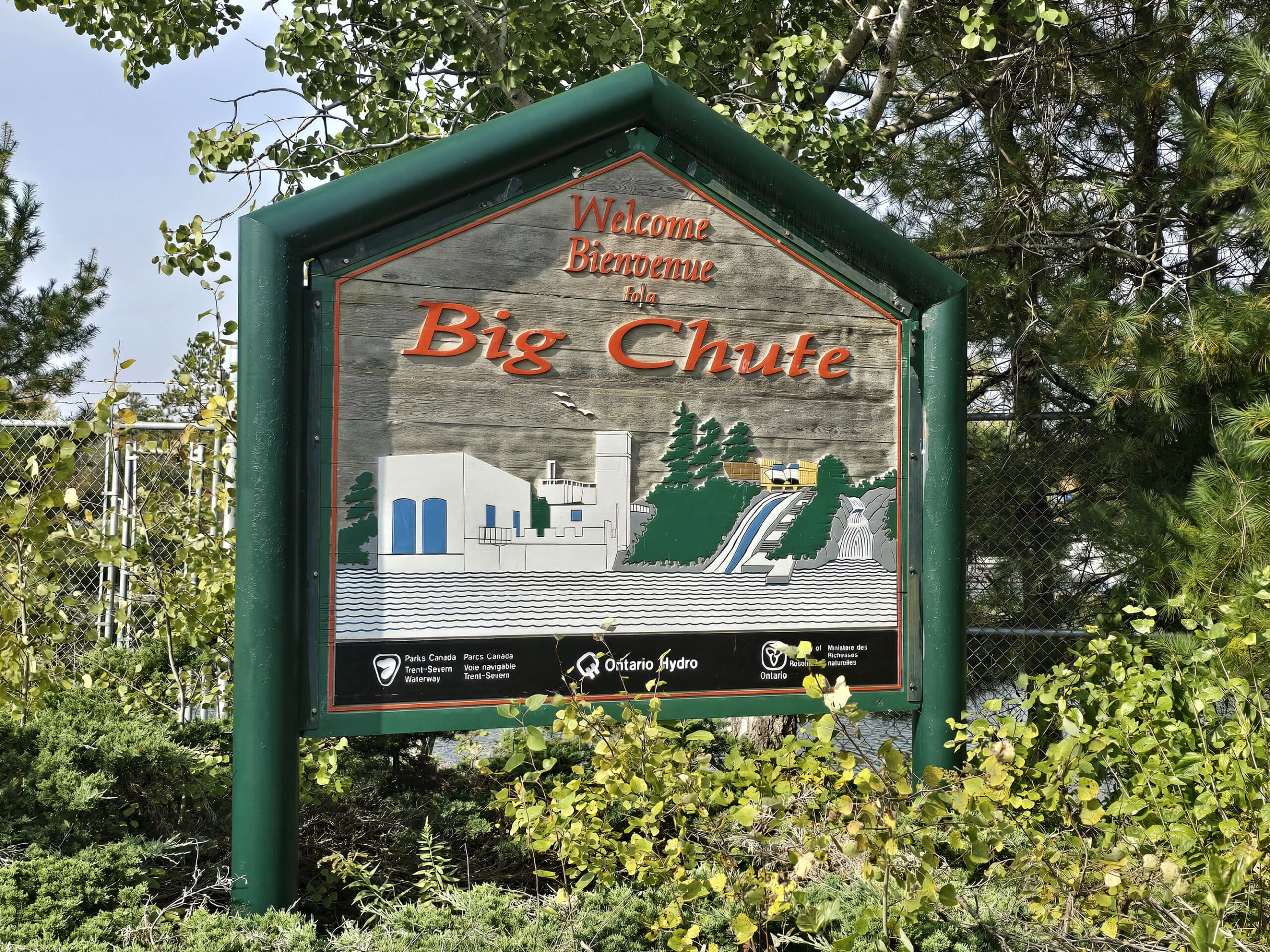 A road sign welcoming people to Big Chute.