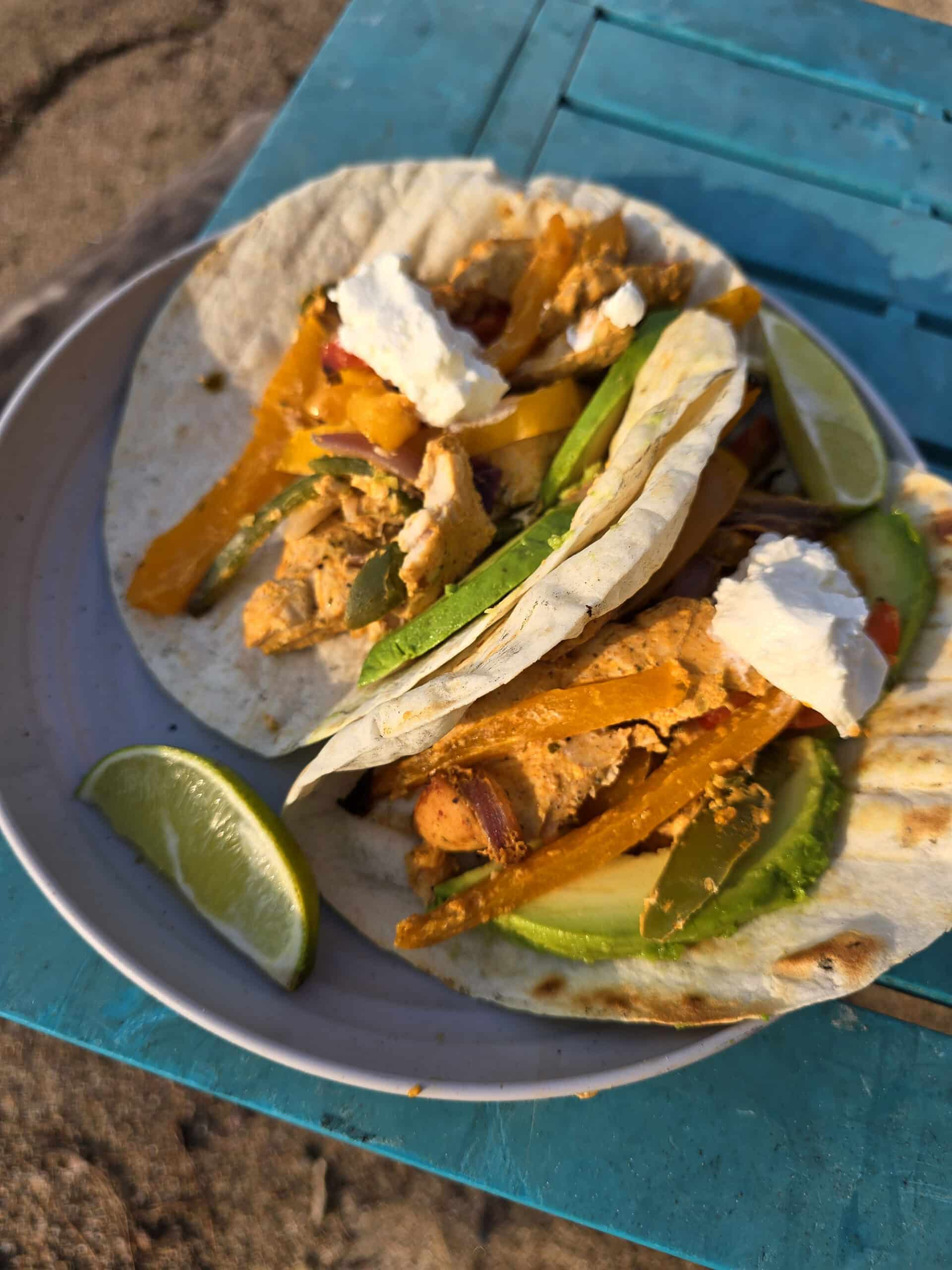 A plate of grilled chicken fajitas.