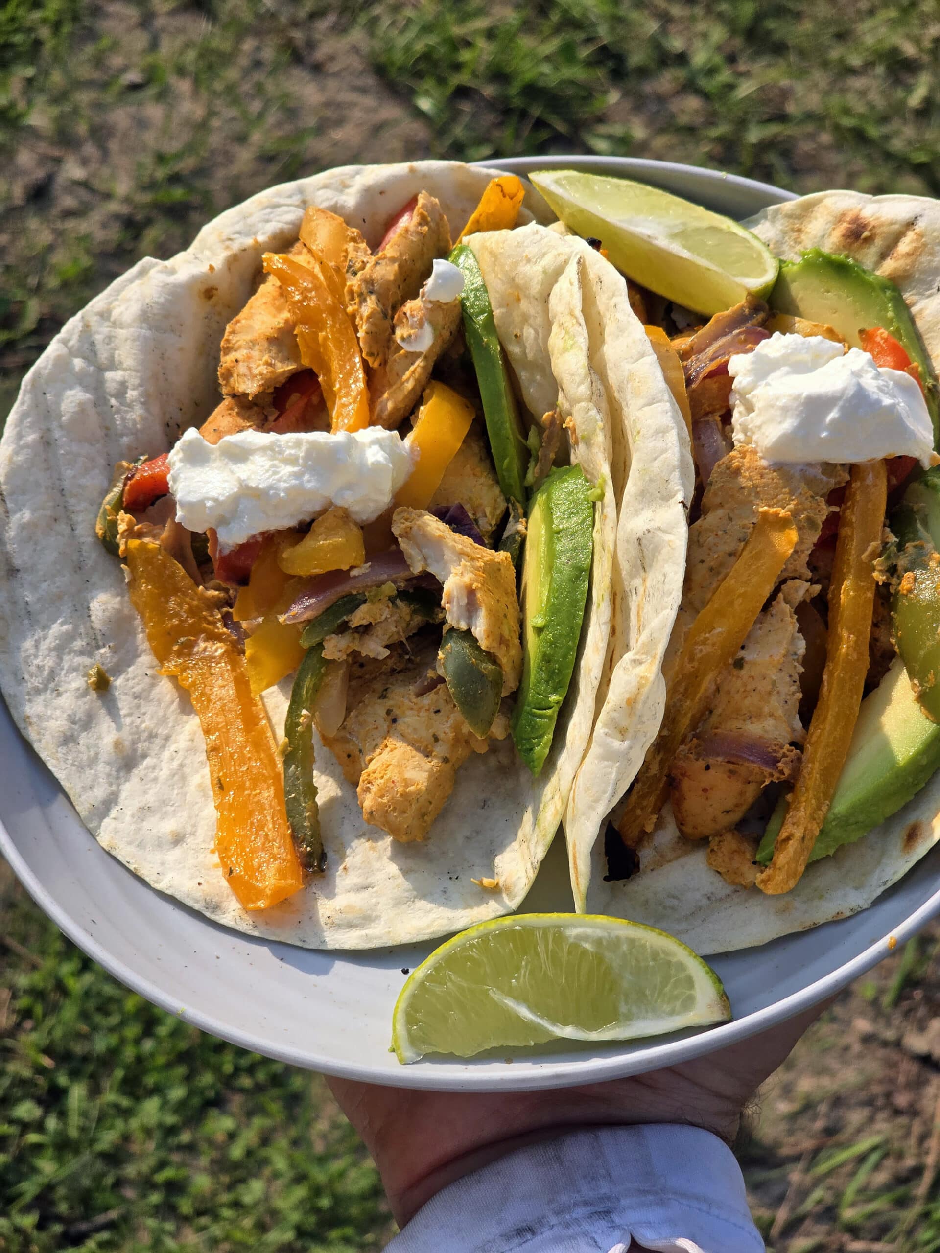 A plate of campfire chicken fajitas.