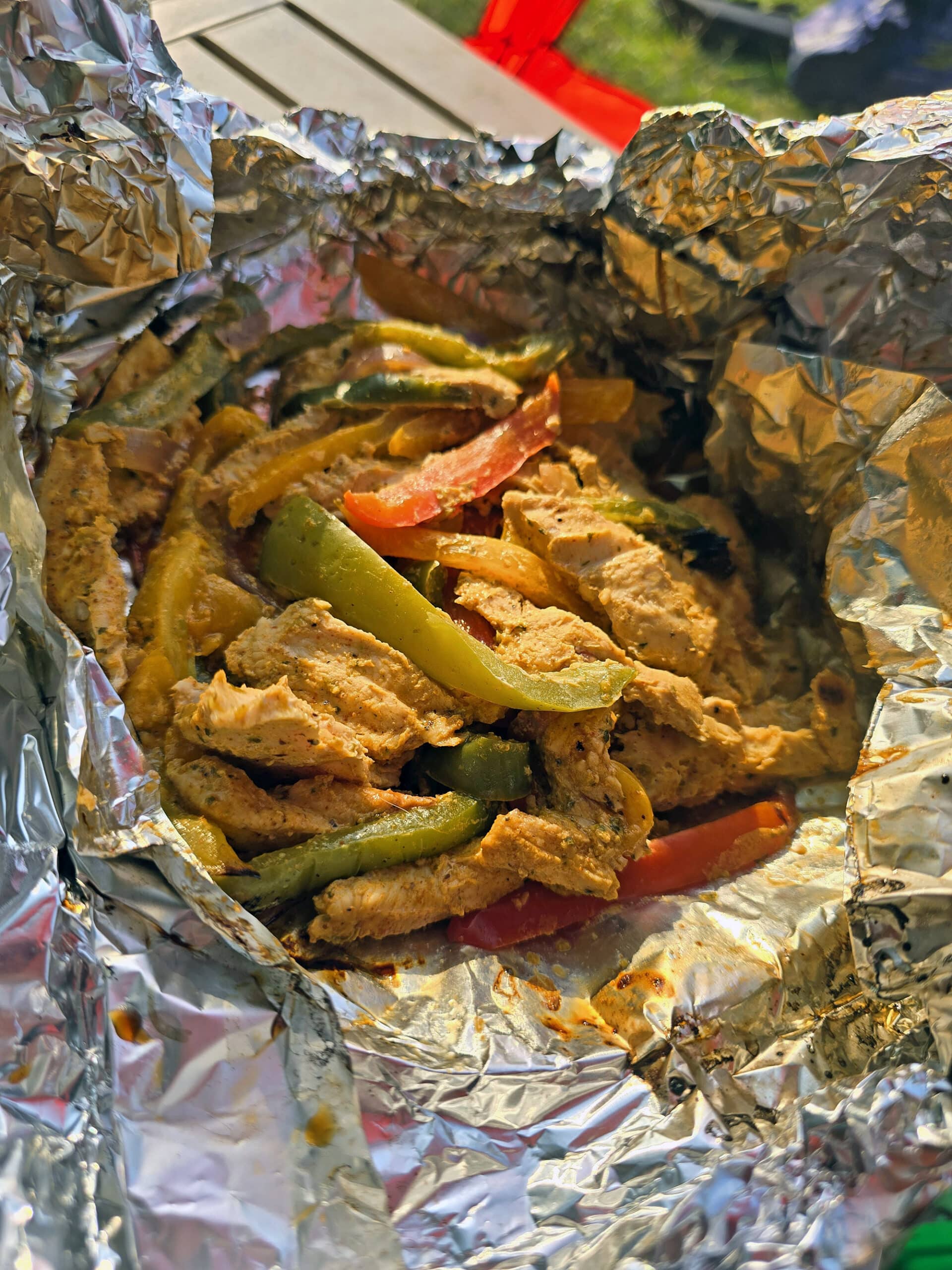 A plate of grilled chicken fajitas.