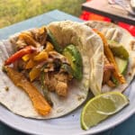 A plate of campfire chicken fajitas.