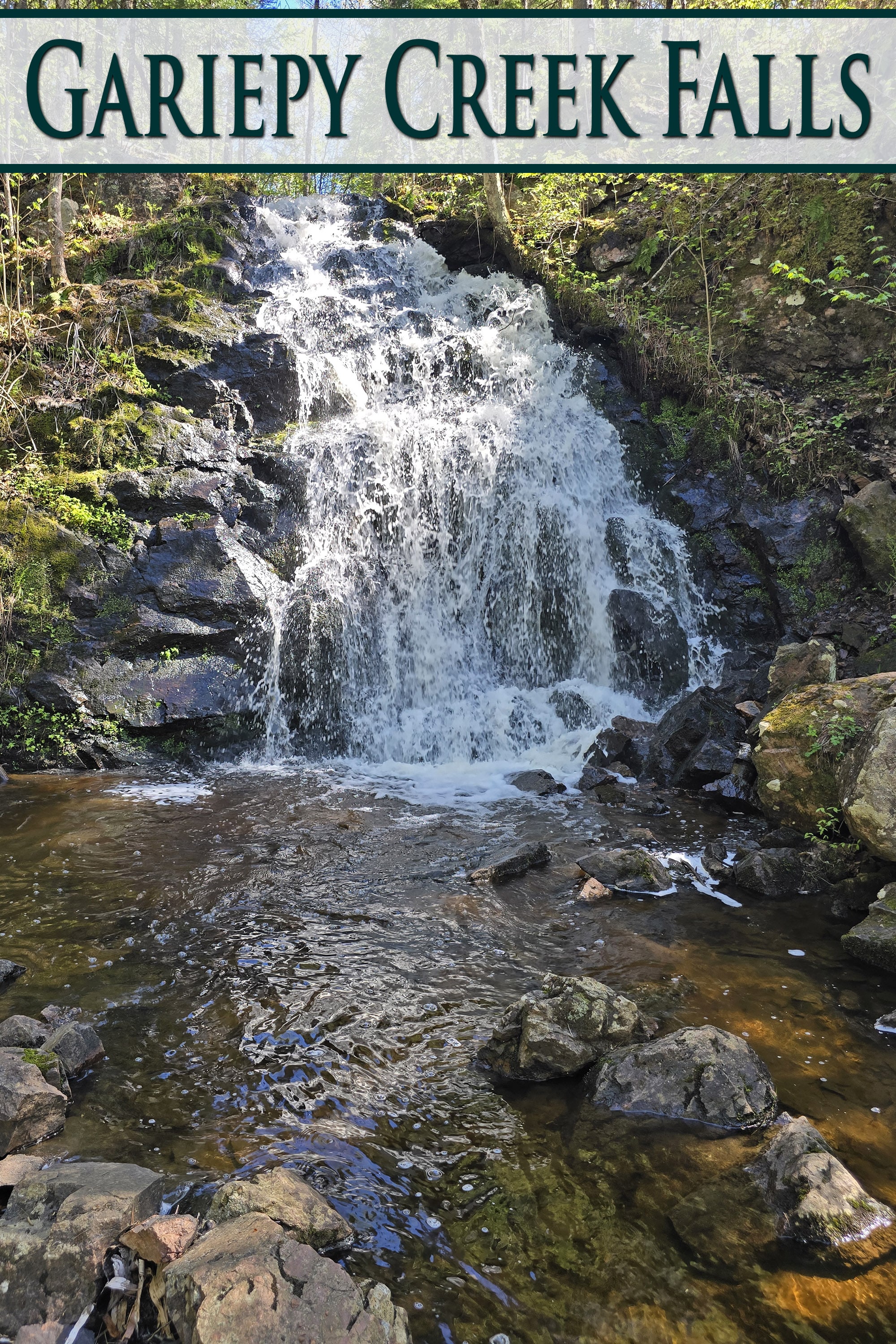 Gariepy Creek Falls Waterfall at high flow. Overlaid text says Gariepy Creek Falls.