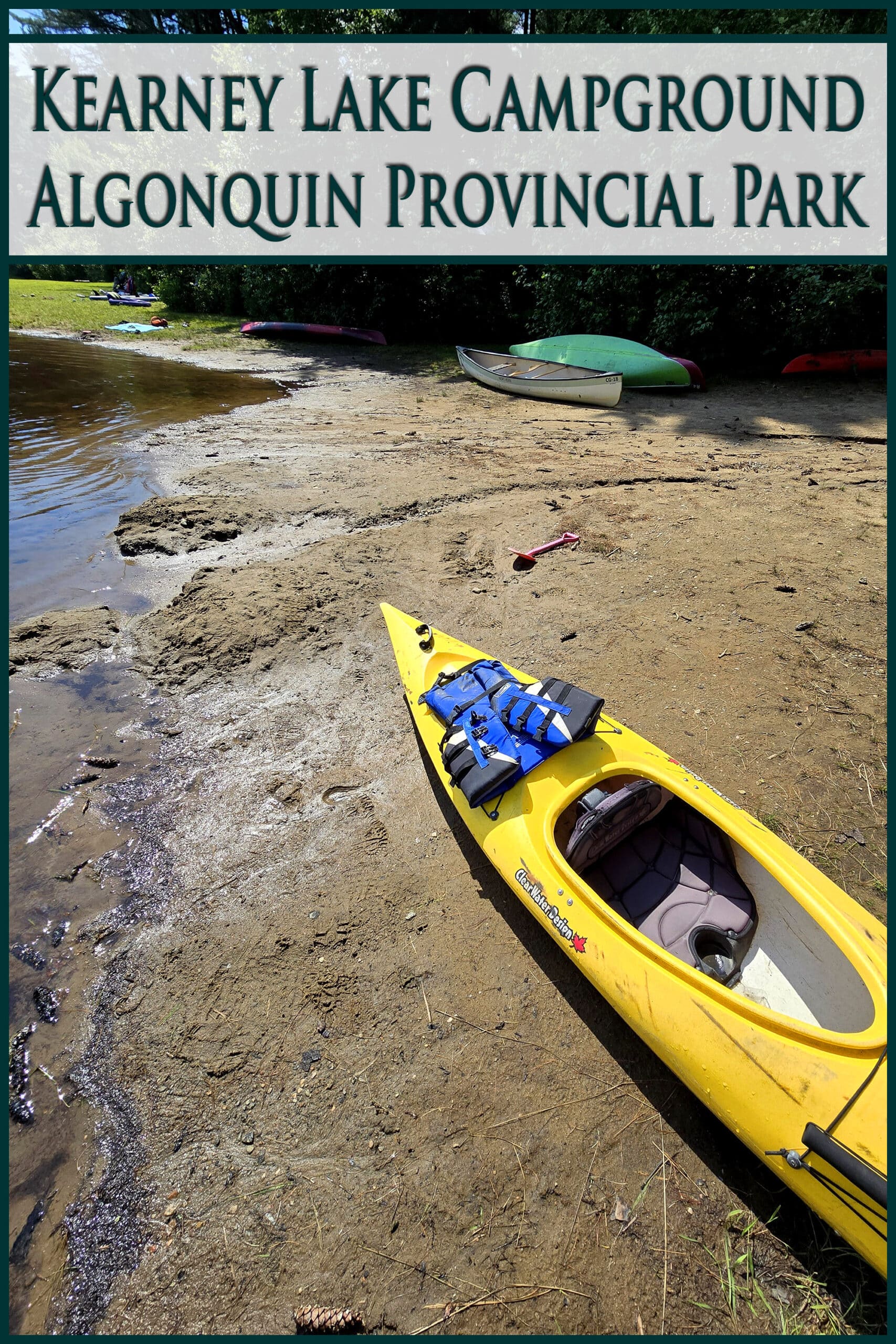 A yellow kayak on the beach. Overlaid text says Kearney Lake Campground, algonquin provincial park.