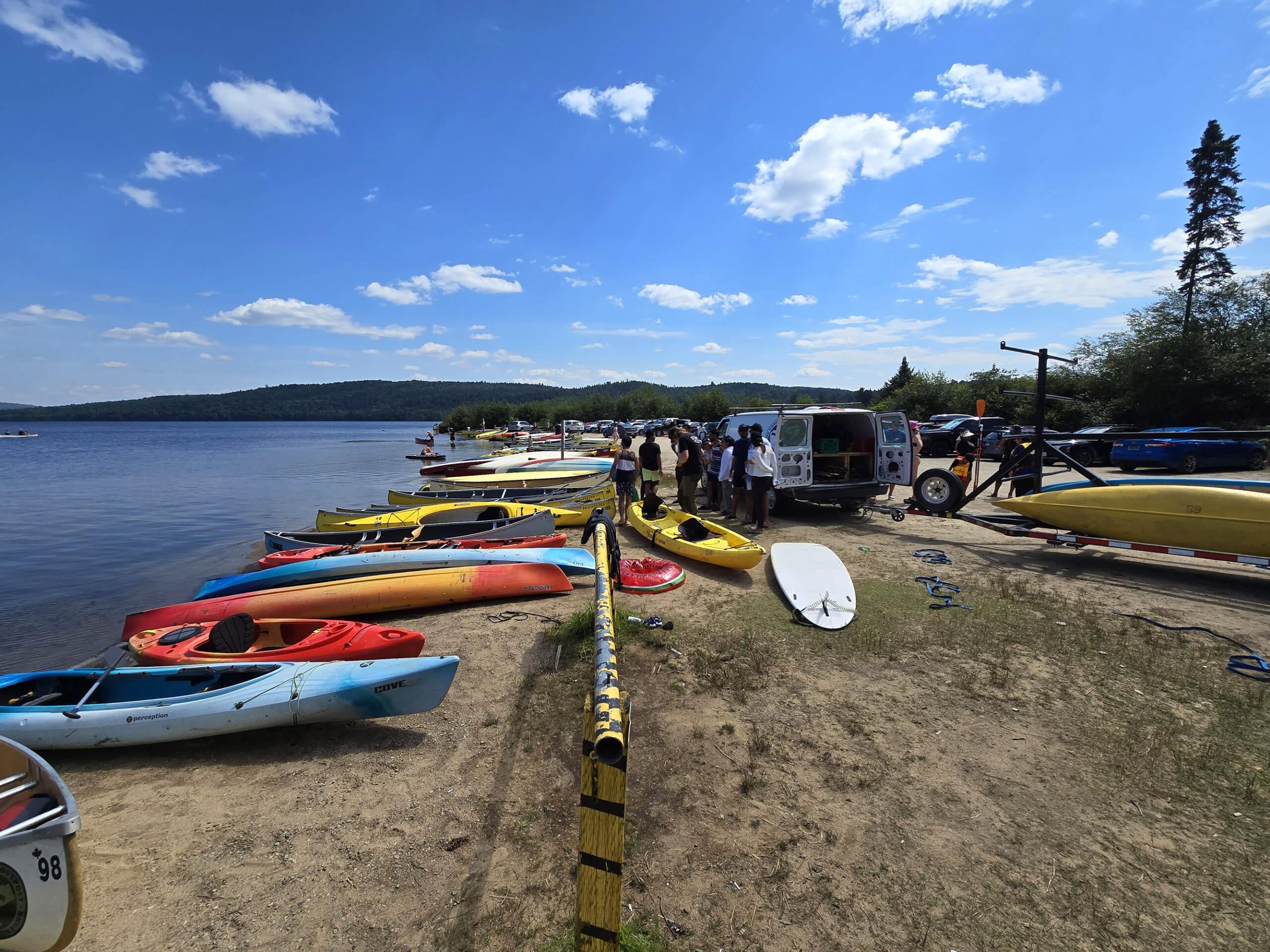 A crowded parking lot on the beach.