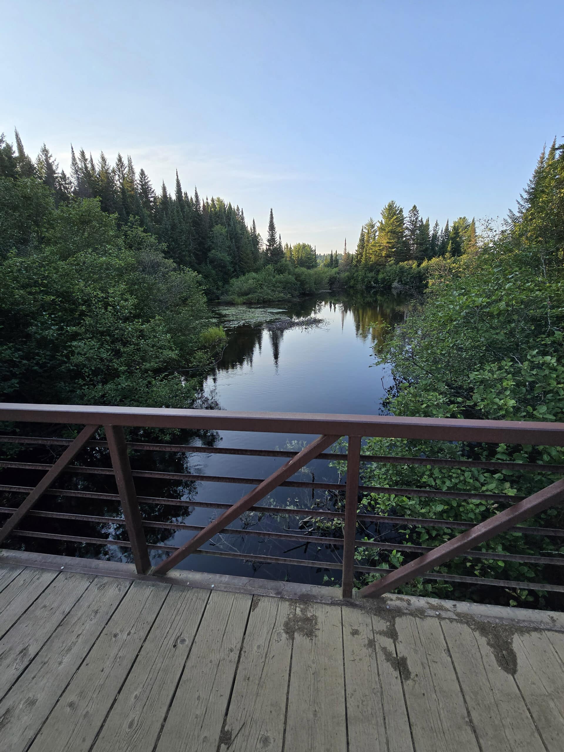 A bridge looking out over the Madawaska River.