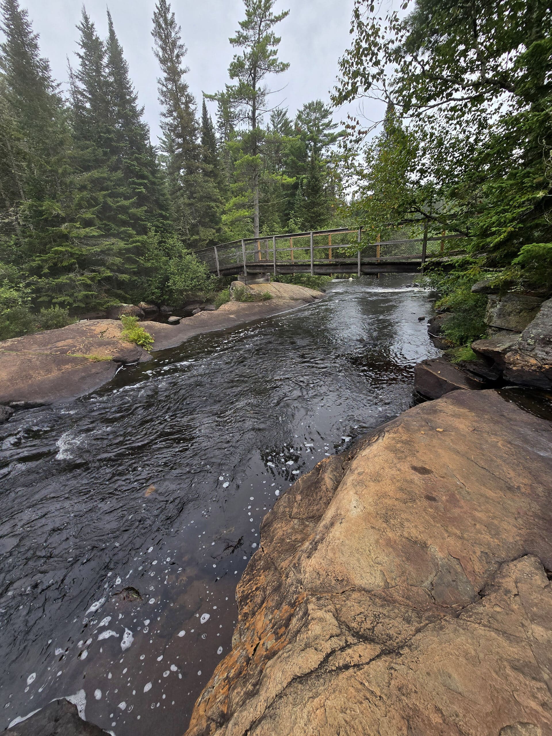 Water running downstream of a cascade waterfall.