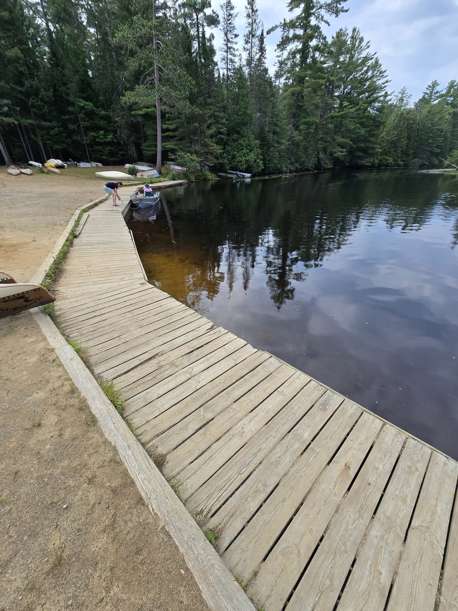 A boardwalk alongside the Rock Lake Campground boat launch.