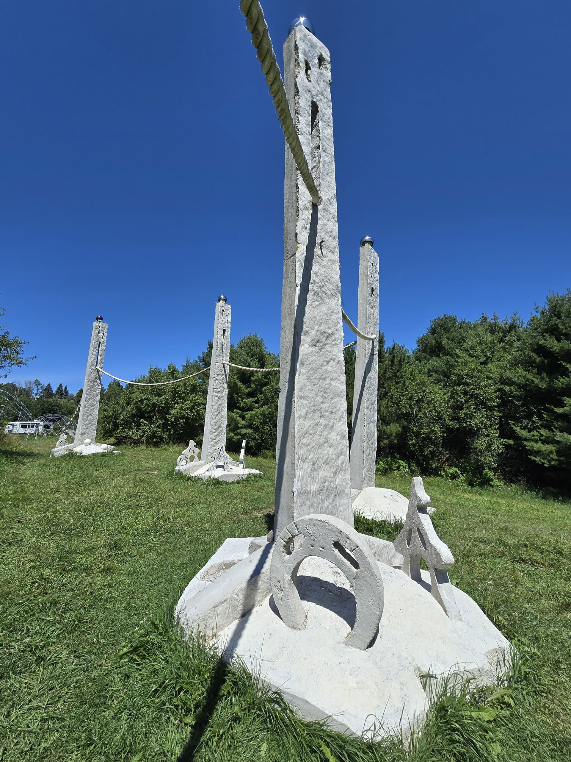 A row of tall obelisk memorials at Screaming Heads.