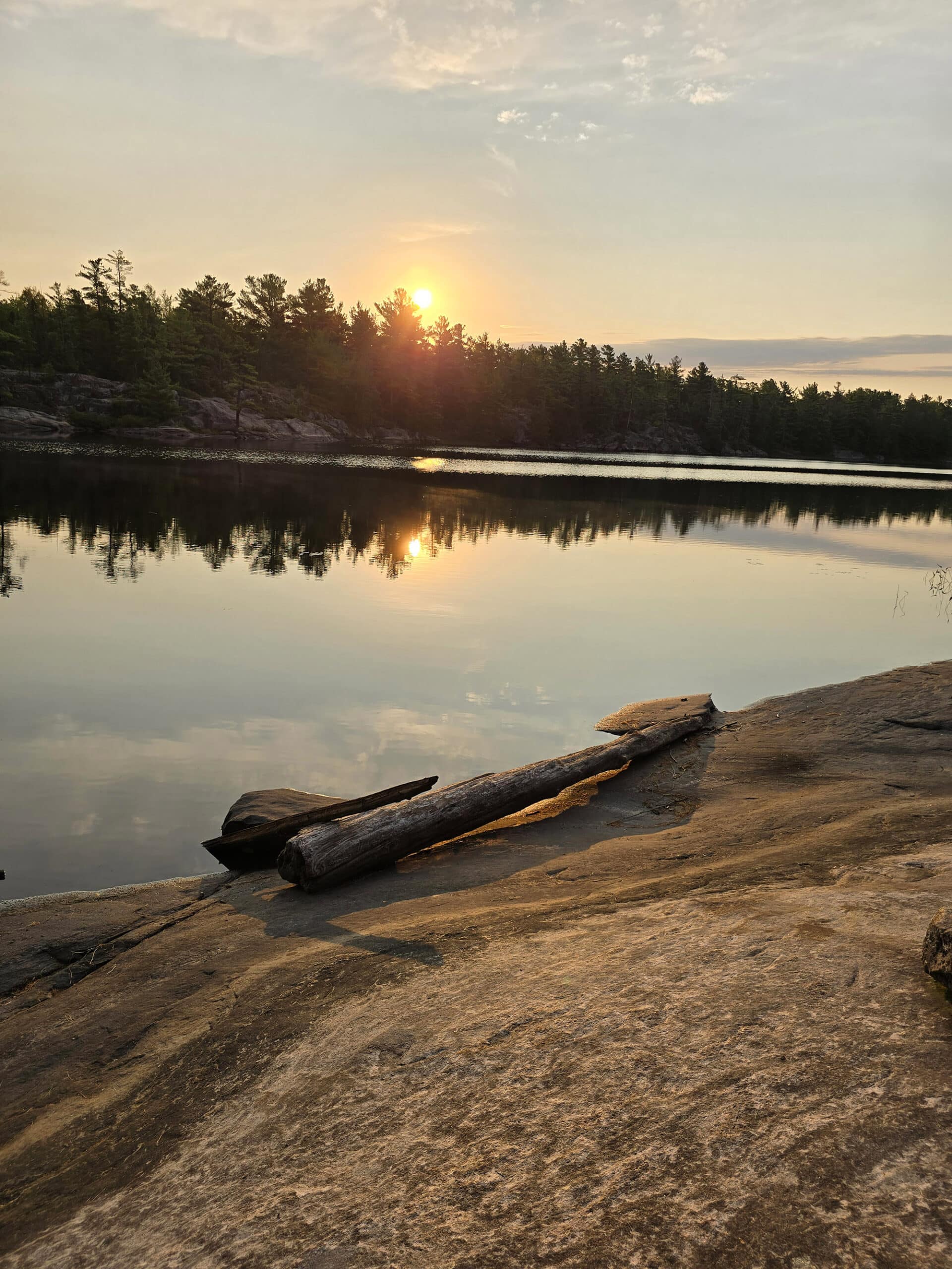 Sunrise over Gut Lake in Grundy Lake Provincial Park.