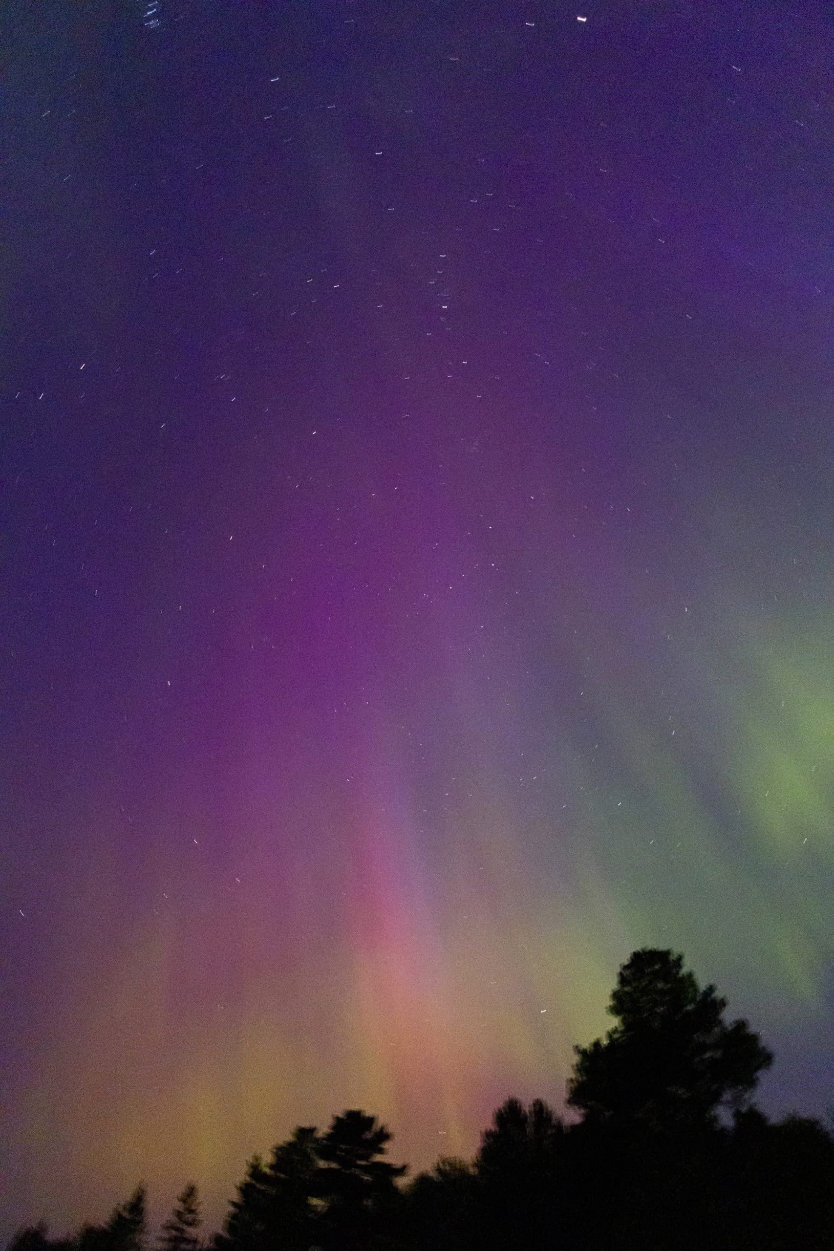 The northern lights over pancake bay provincial park.