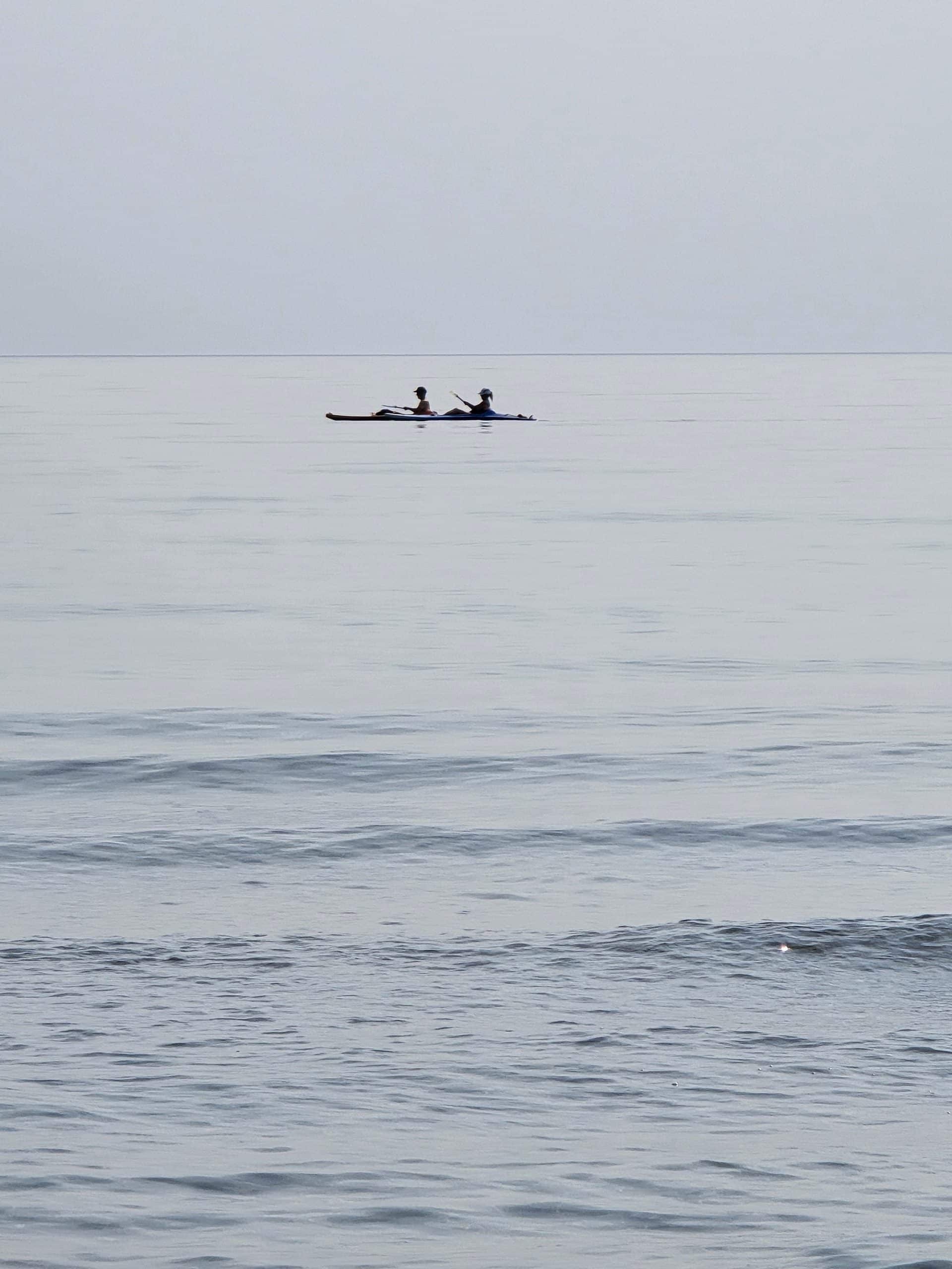 2 kayakers on lake superior.