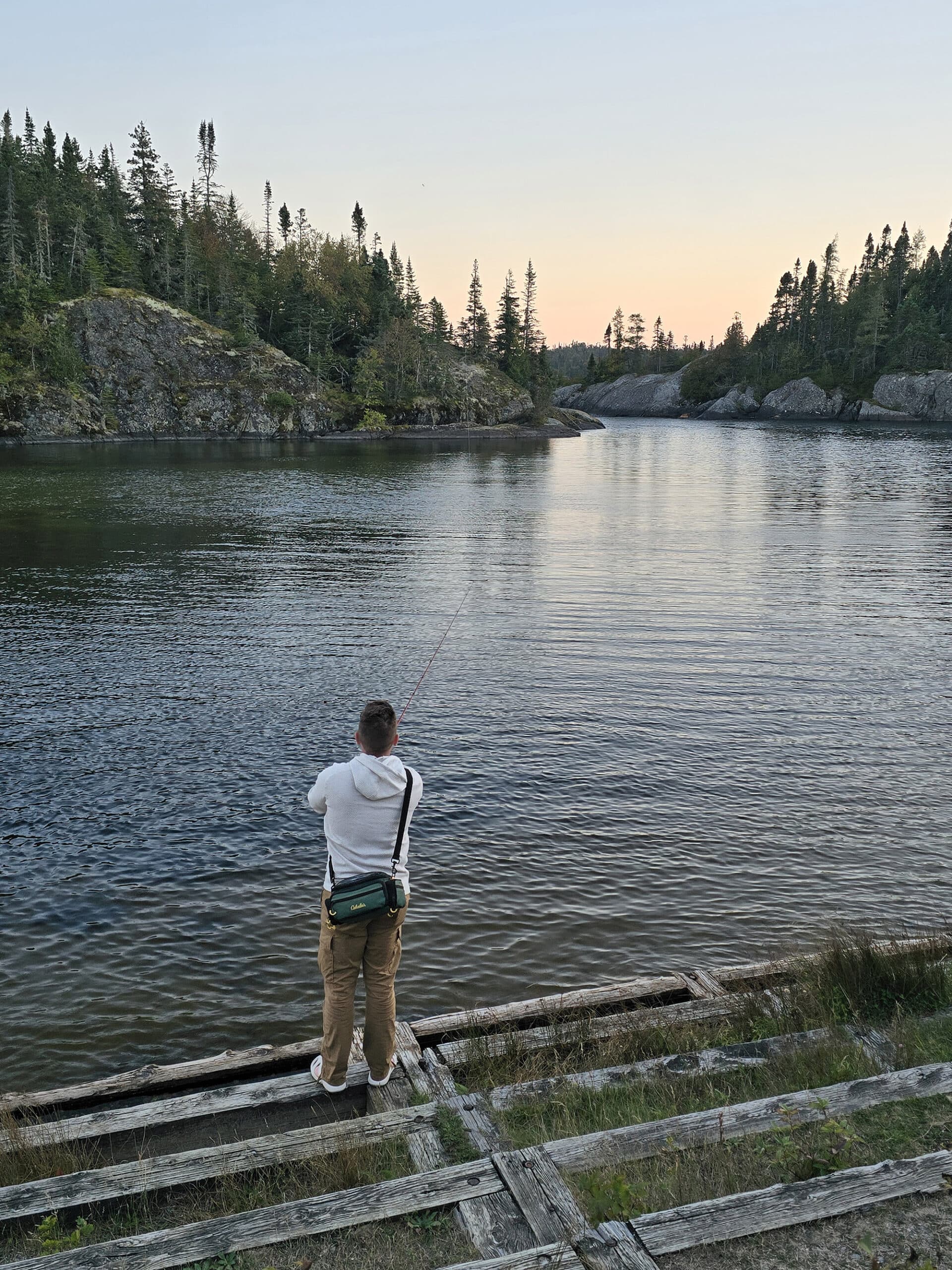 A man fishing at Hattie Cove.