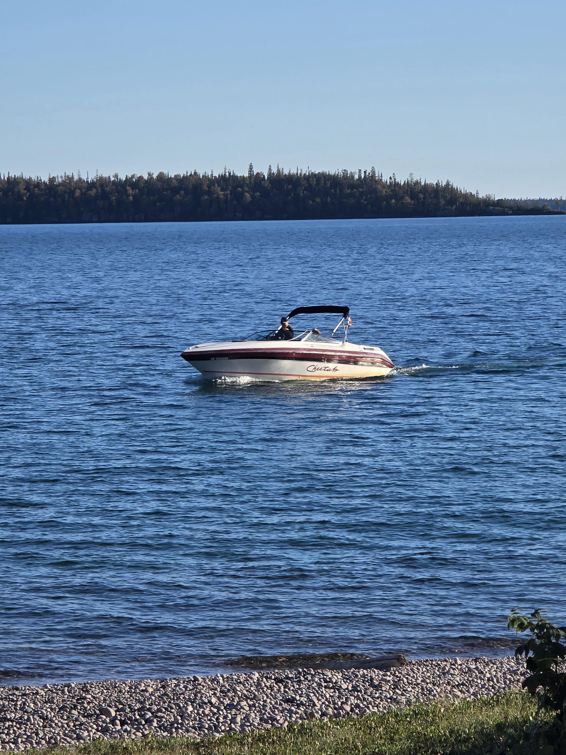 A small power boat on lake superior.