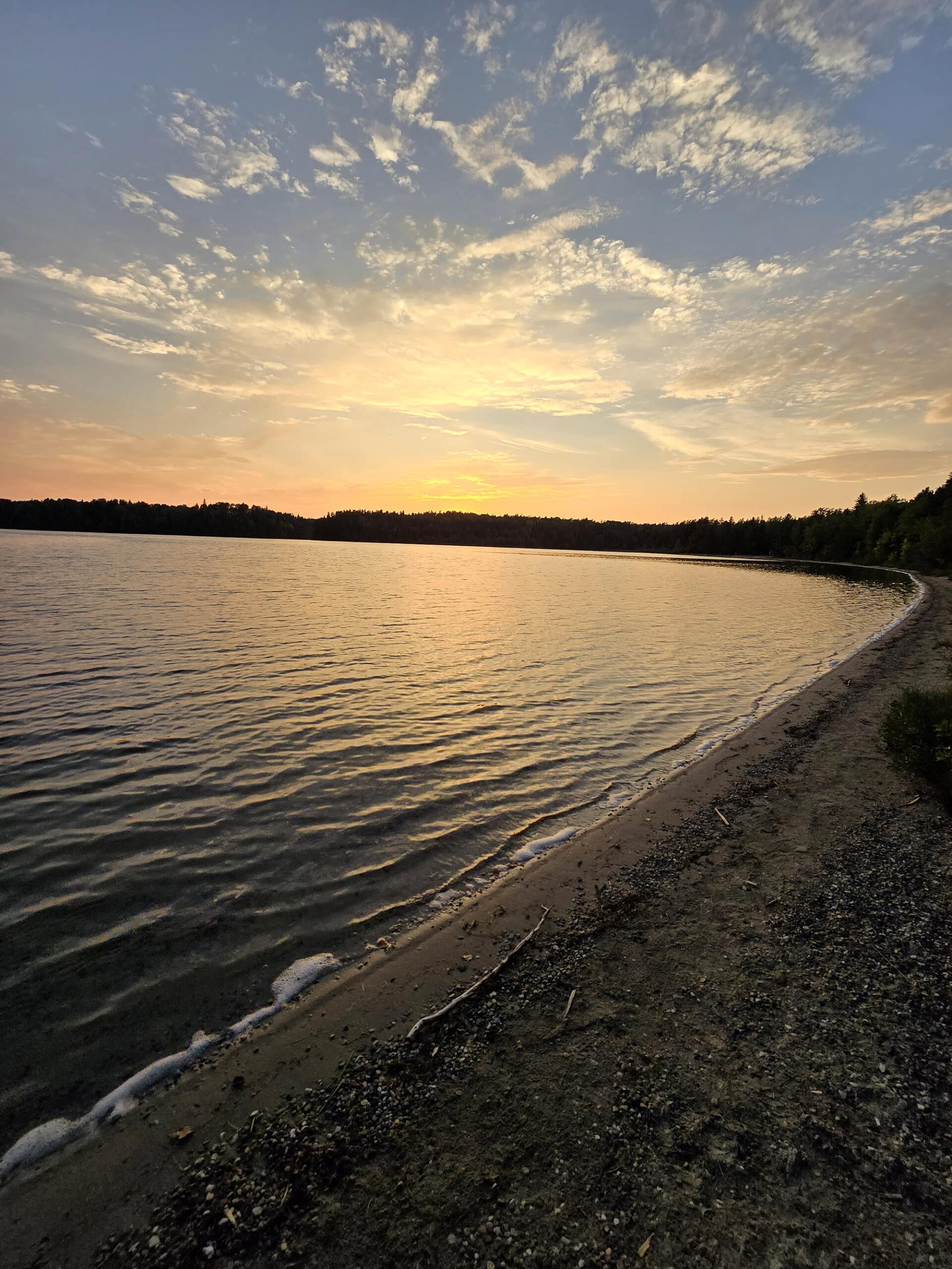 sunset over white lake.