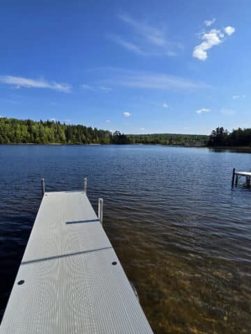 A floating dock on white lake.