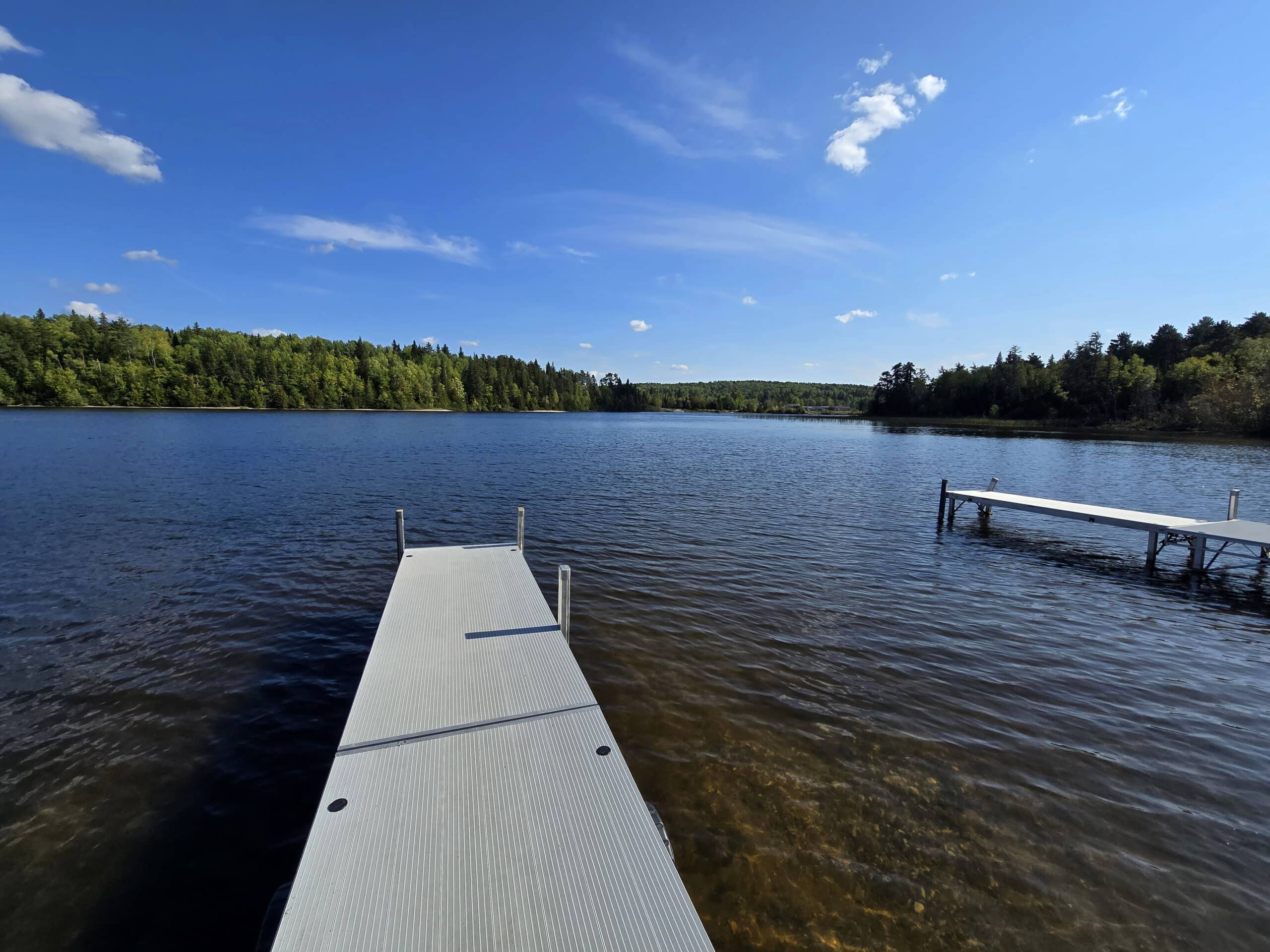 A floating dock on white lake.