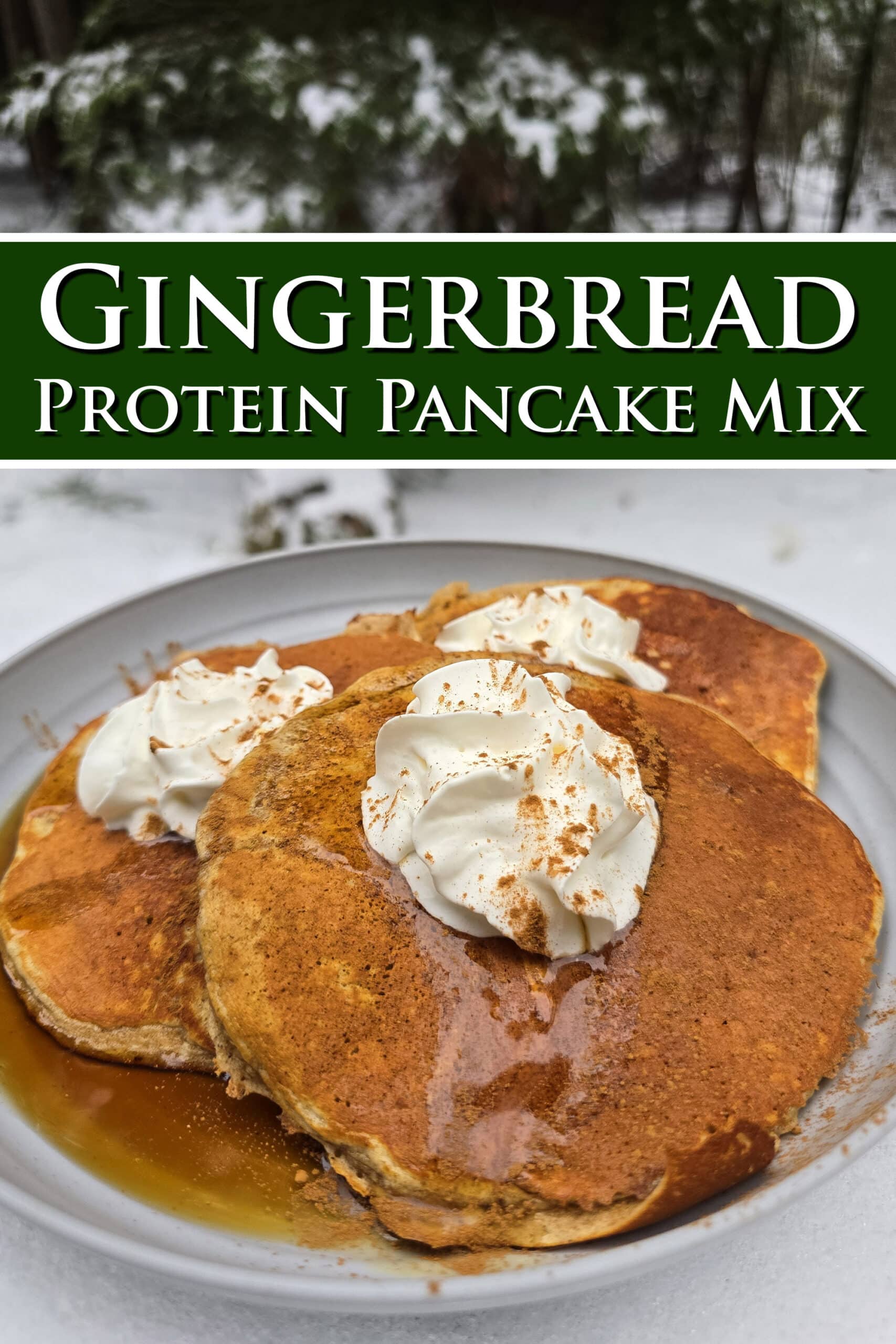 A plate of gingerbread pancakes with maple syrup and whipped cream,  on a snow covered picnic table. Overlaid text says gingerbread protein pancake mix.