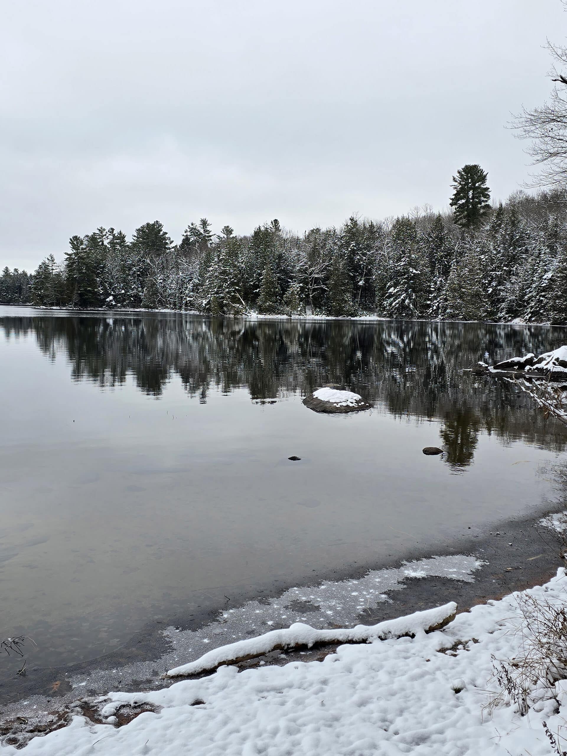 Silent lake on a still winter day.