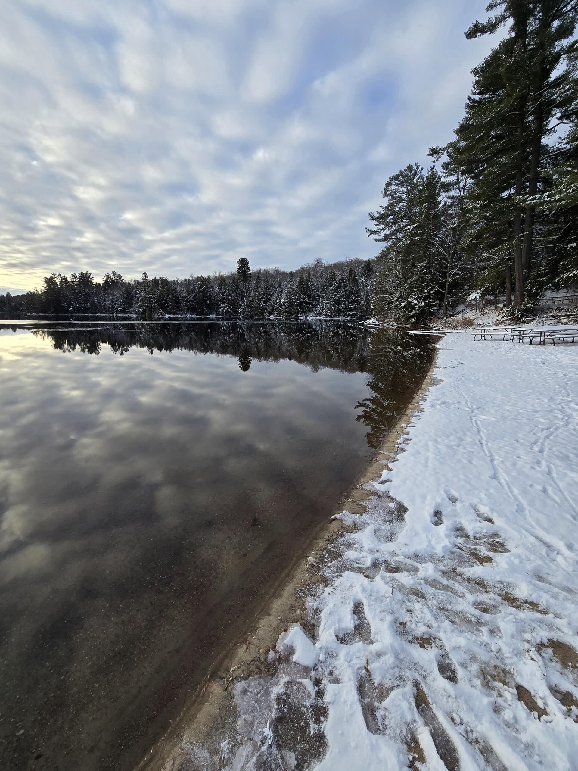 Silent lake on a still winter day.