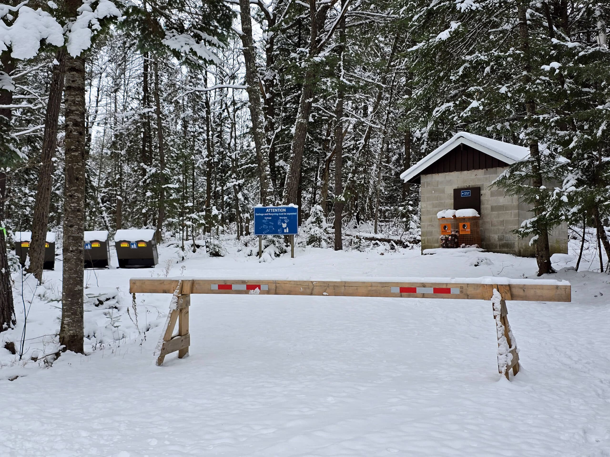 The snow covered garbage station at silent lake provincial park.