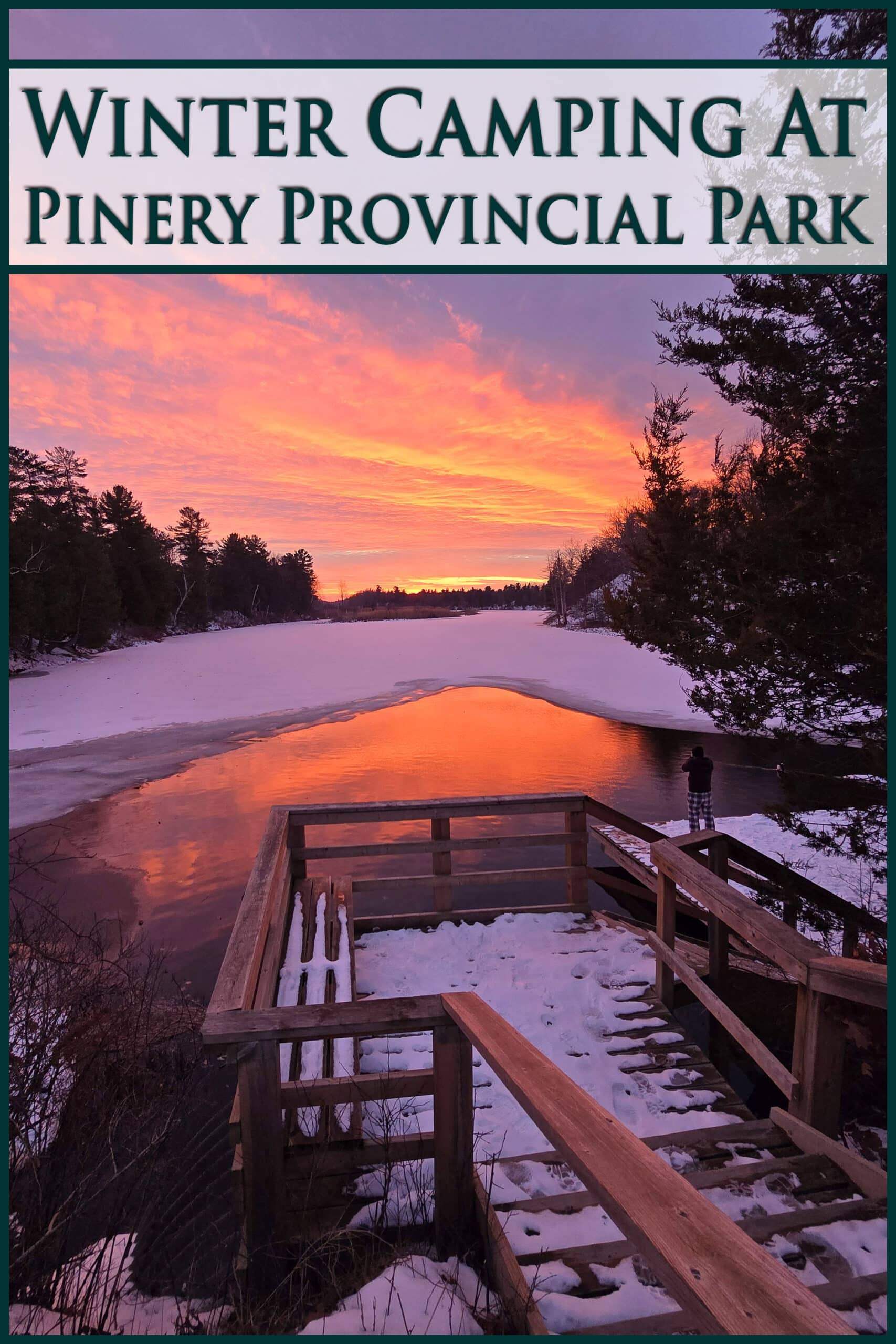 A bright pink sunset over old ausable channel in winter. Overlaid text says winter camping at Pinery Provincial Park.