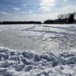 A skating rink cleared on valens lake, on a sunny day.