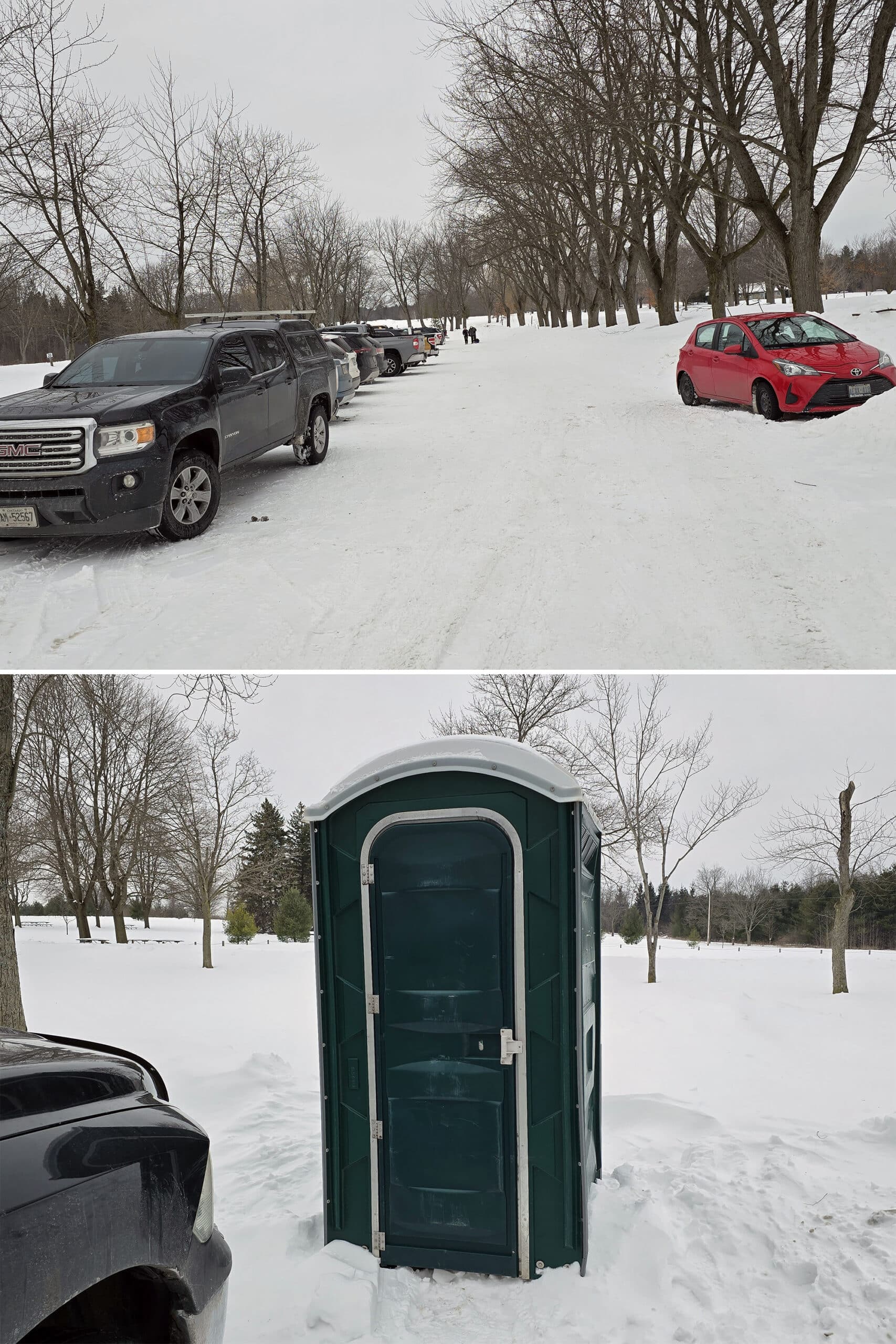 A small crowded parking lot and a porta potty on the edge of it.