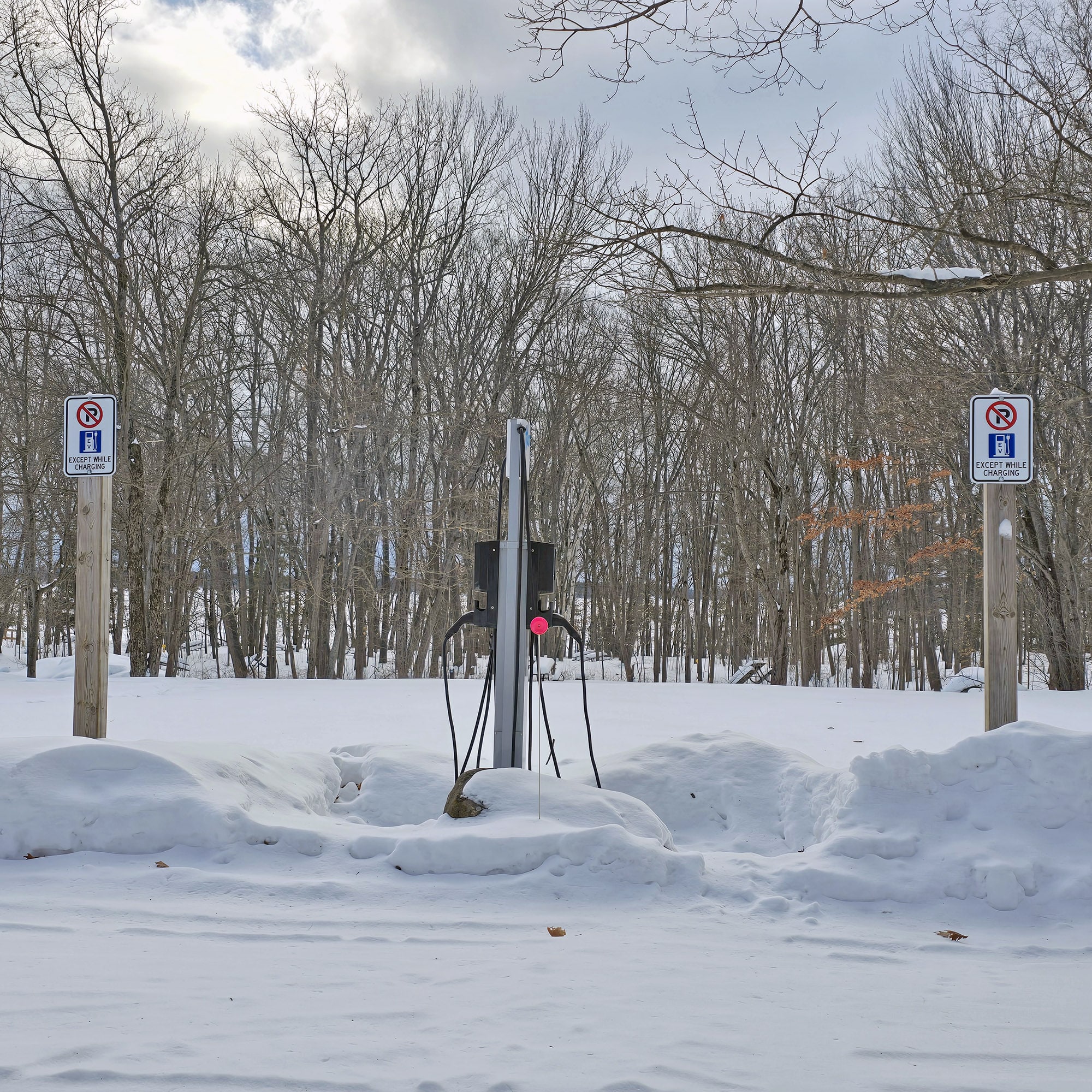 An EV car charging station in the winter.