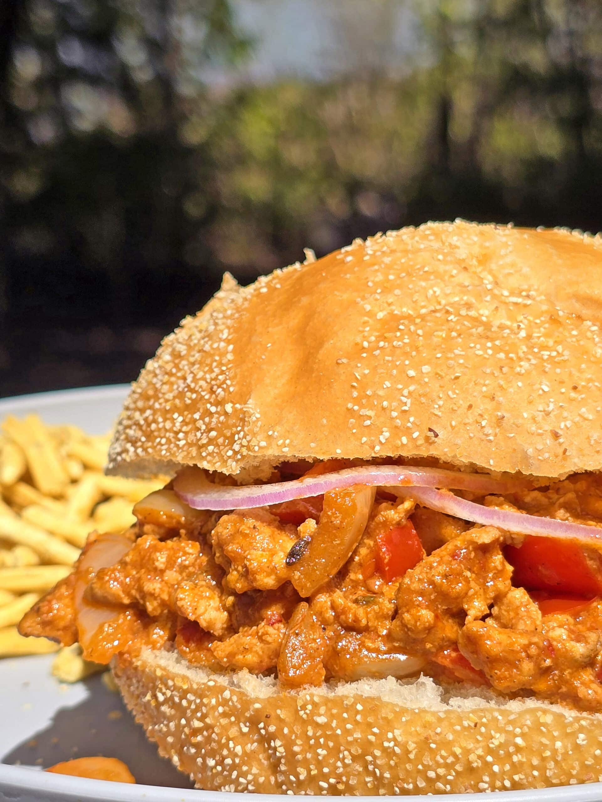 An Indian sloppy joes sandwich on a plate.